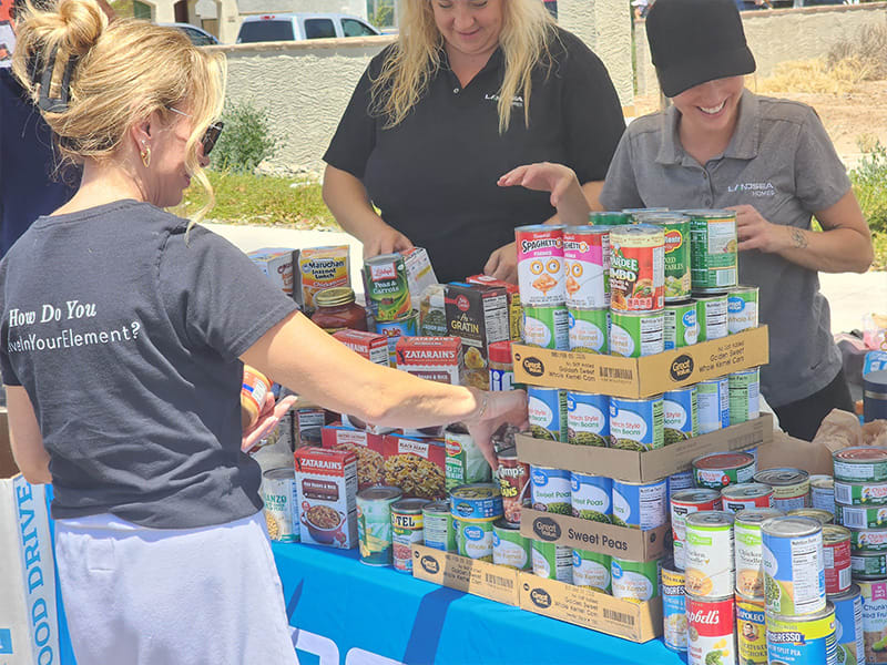 Landsea Homes Arizona participating in a food drive for charity