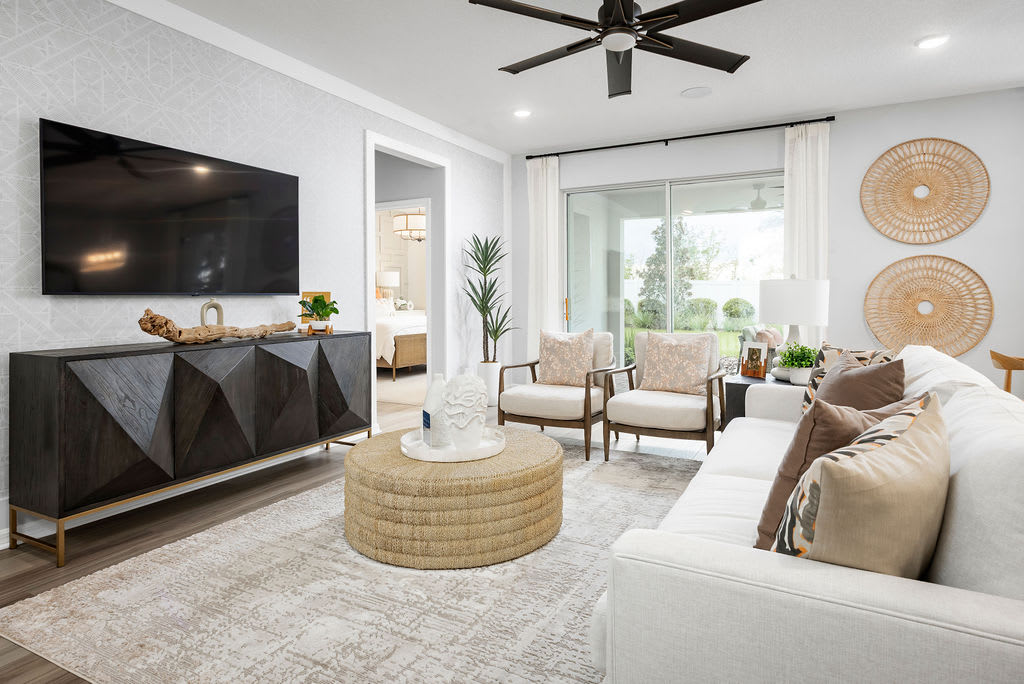 Bright, airy living that flows effortlessly to the outdoors. | Eagletail Landings | New Homes in Howey-in-the-Hills, FL | Landsea Homes