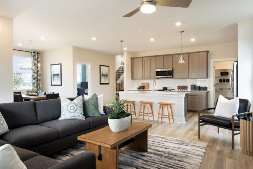 Great Room to Kitchen | Eli at Village at Manor Commons in Manor, TX by Landsea Homes