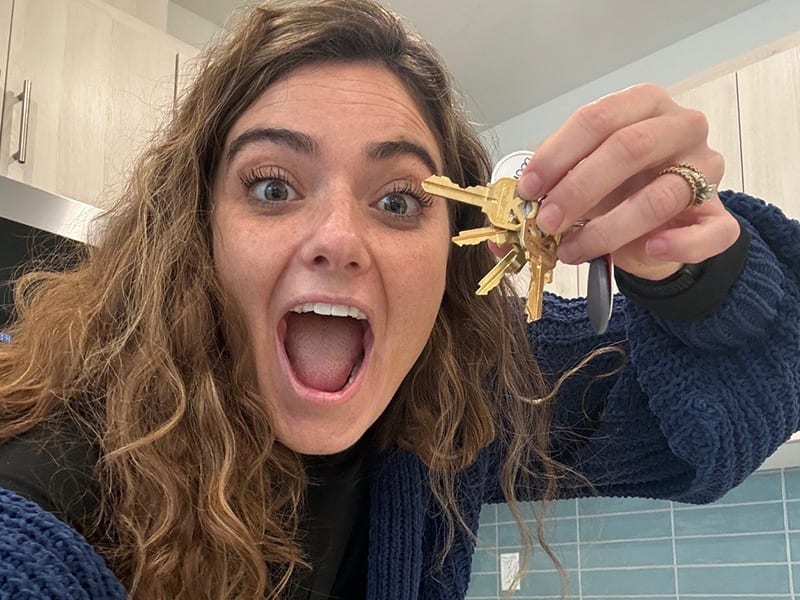 First-time homebuyer with the keys to her new house