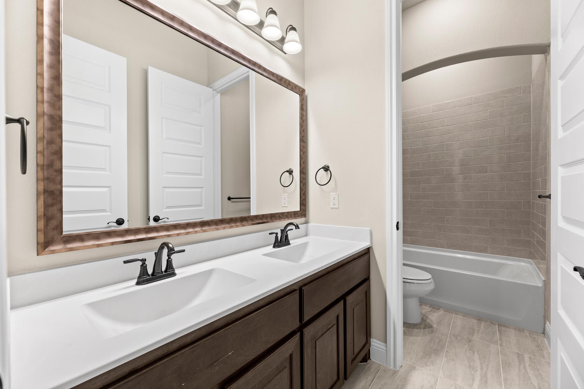 Bathroom | Concept 2623 at Hidden Creek Estates in Van Alstyne, TX by Landsea Homes