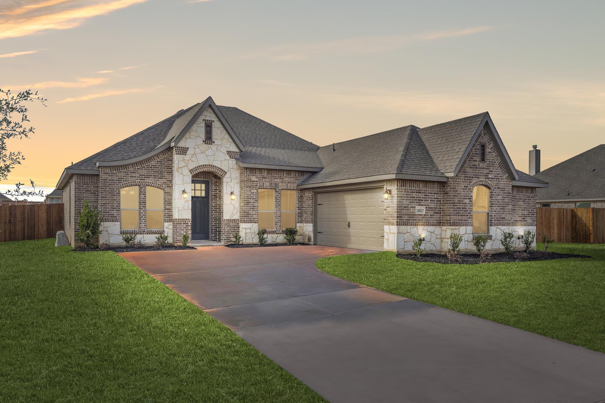Elevation A with Stone | Concept 2267 at Mockingbird Hills in Joshua, TX by Landsea Homes