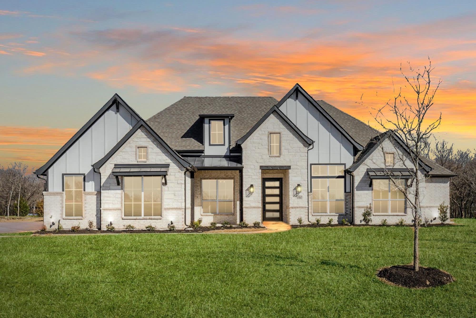 Elevation B with Stone | Concept 3441 at The Meadows in Gunter, TX by Landsea Homes