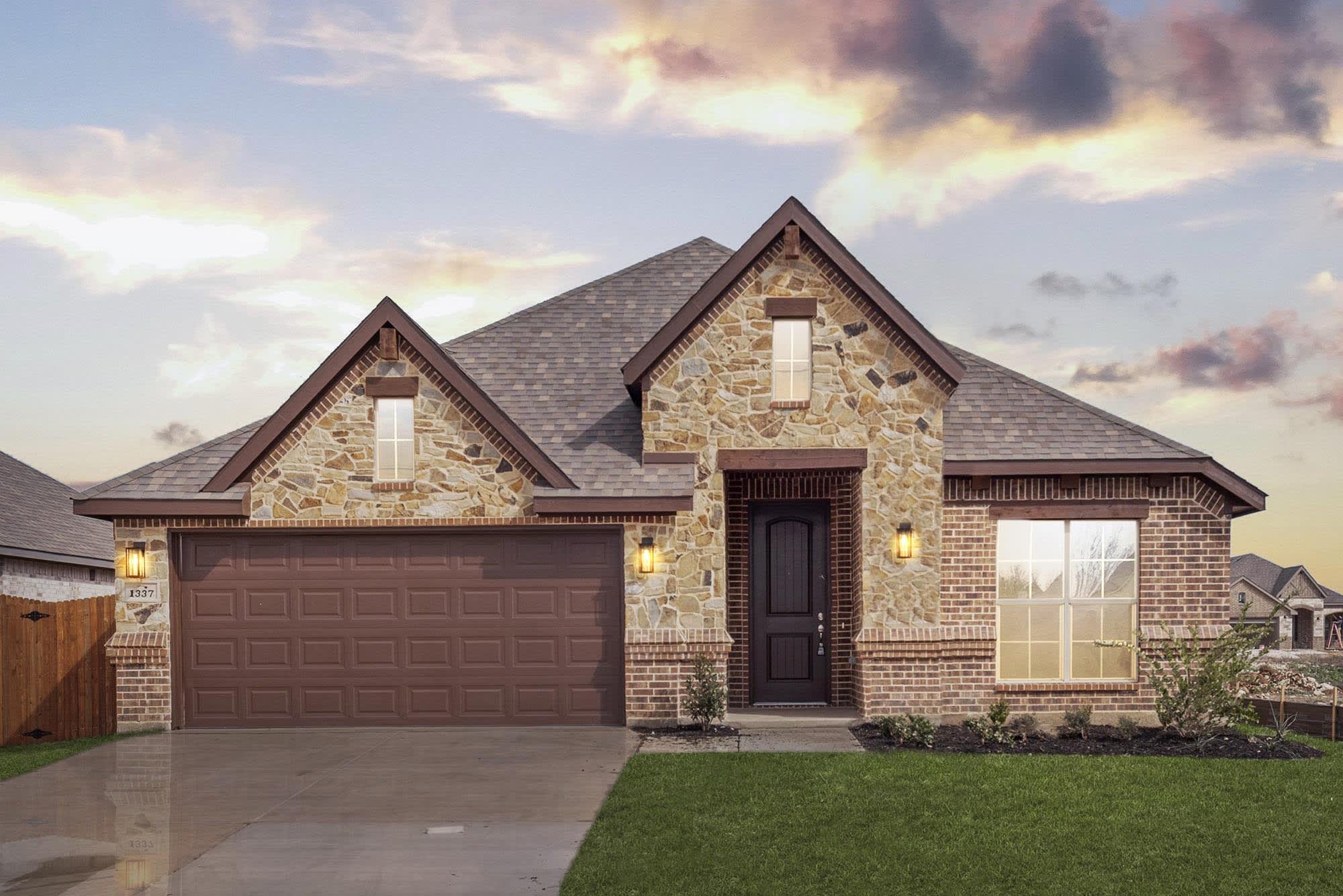 Elevation C with Stone | Concept 2186 at Silo Mills - Select Series in Joshua, TX by Landsea Homes