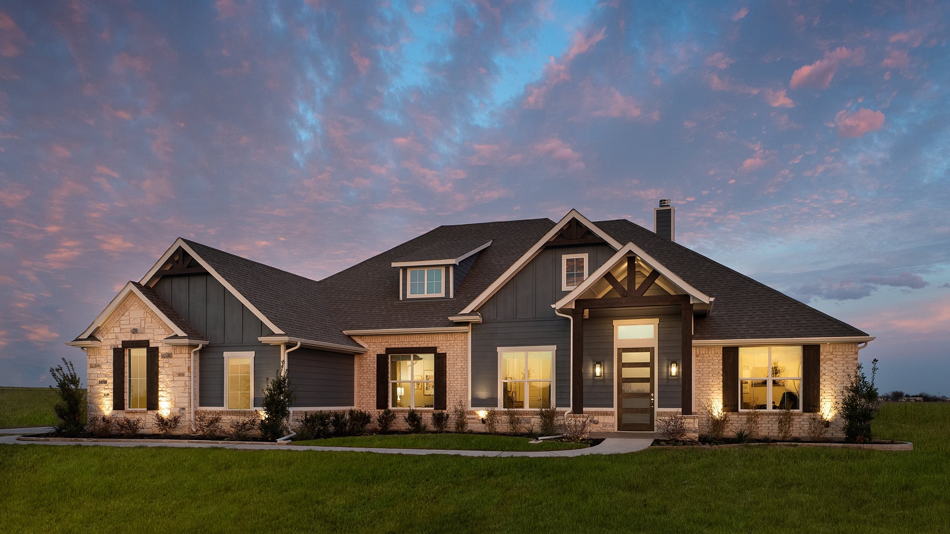Elevation C with Stone | Concept 3141 at The Meadows in Gunter, TX by Landsea Homes