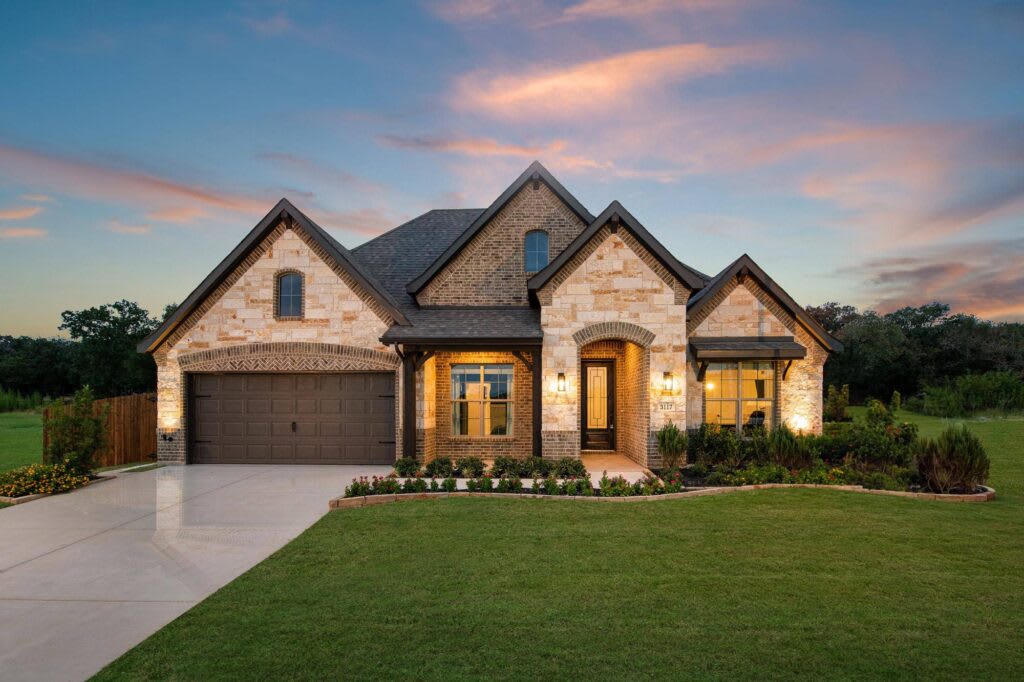 Elevation D with Stone | Concept 2464 at Oak Hills in Burleson, TX by Landsea Homes