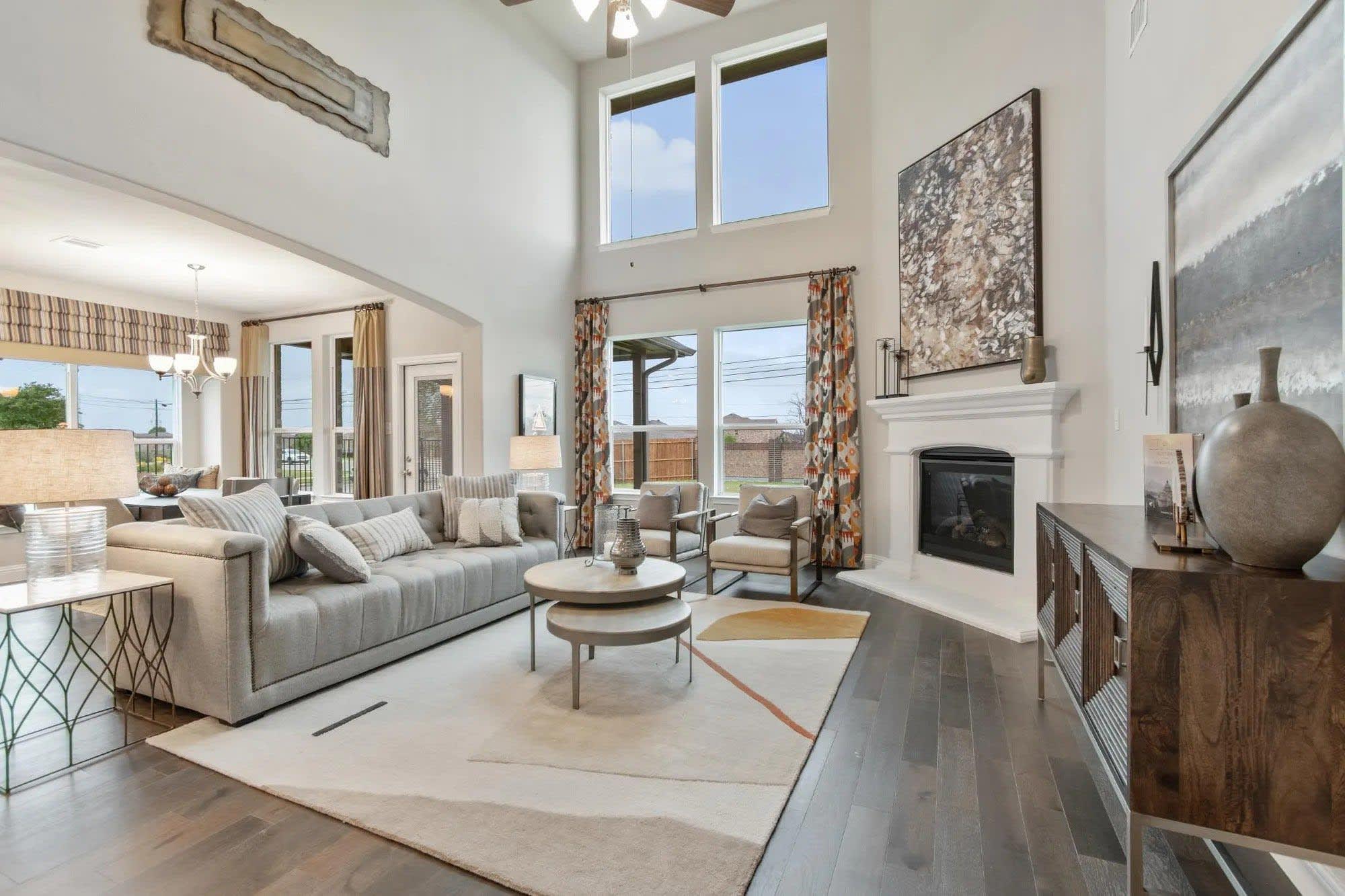 Family Room | Concept 3135 at Coyote Crossing in Godley, TX by Landsea Homes