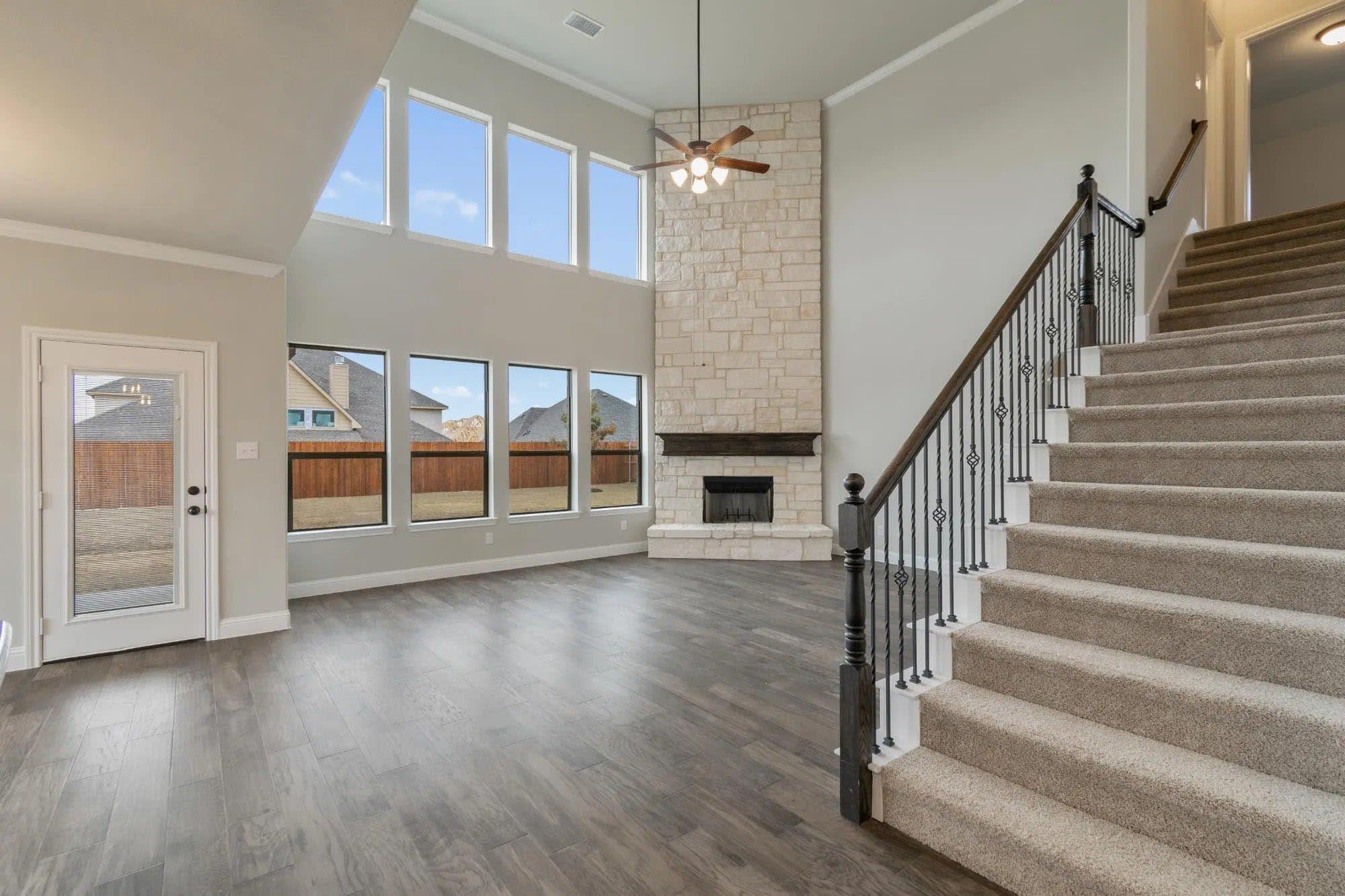 Family Room | Concept 3218 at Abe's Landing in Granbury, TX by Landsea Homes
