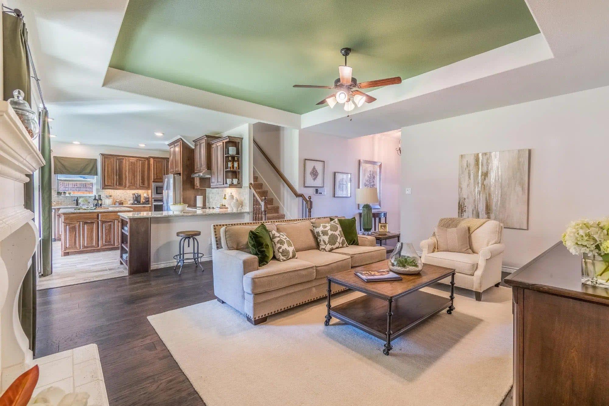 Family Room to Kitchen | Concept 2379 at Villages of Walnut Grove in Midlothian, TX by Landsea Homes