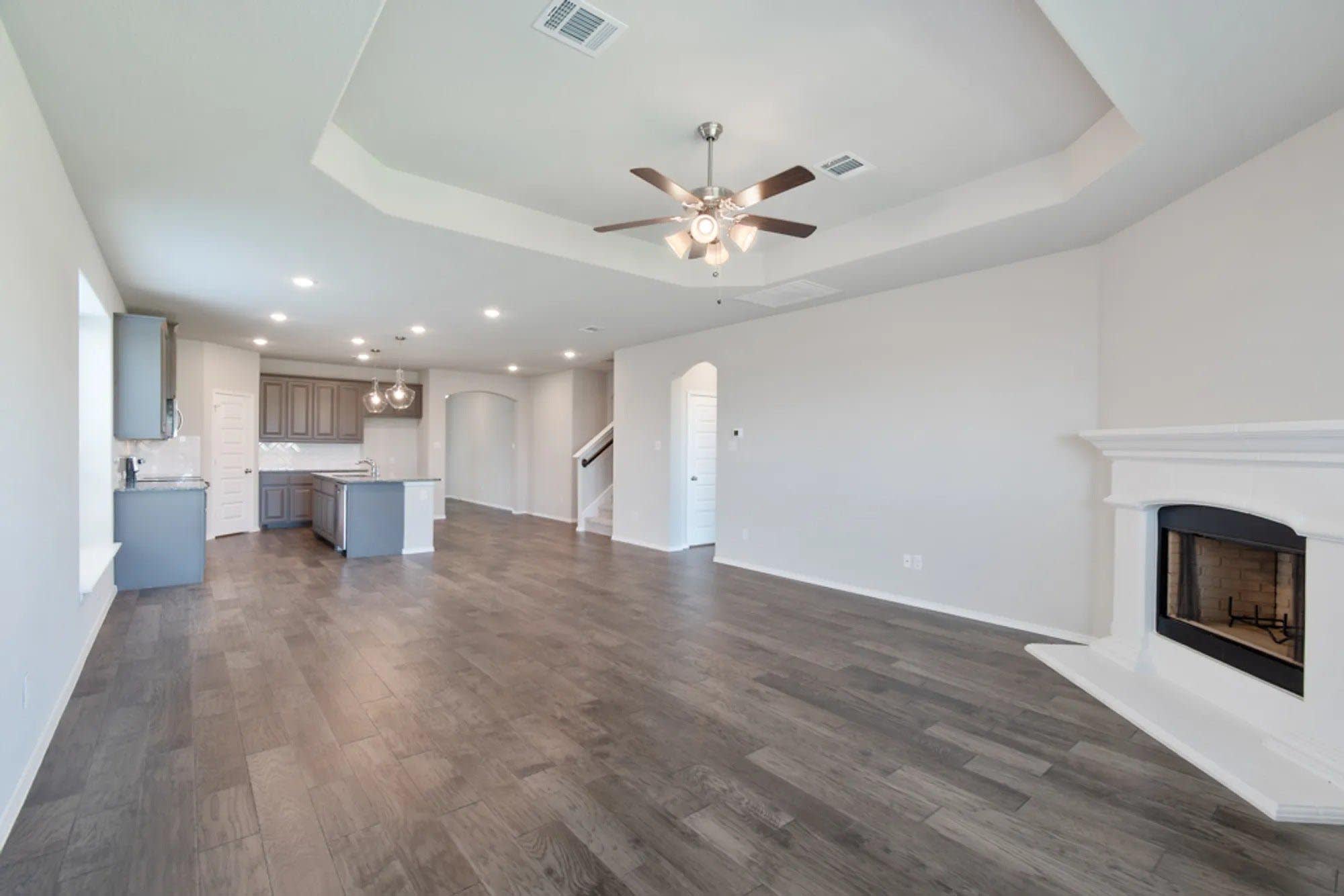 Family Room to Kitchen | Concept 2870 at Summer Crest in Fort Worth, TX by Landsea Homes
