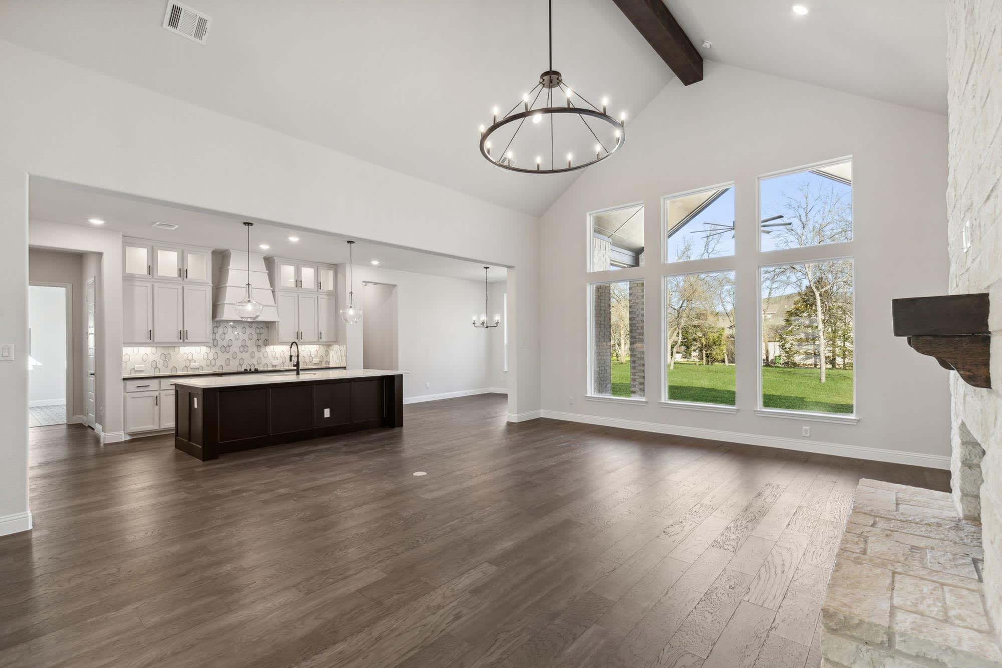 Family Room to Kitchen | Concept 3441 at The Meadows in Gunter, TX by Landsea Homes