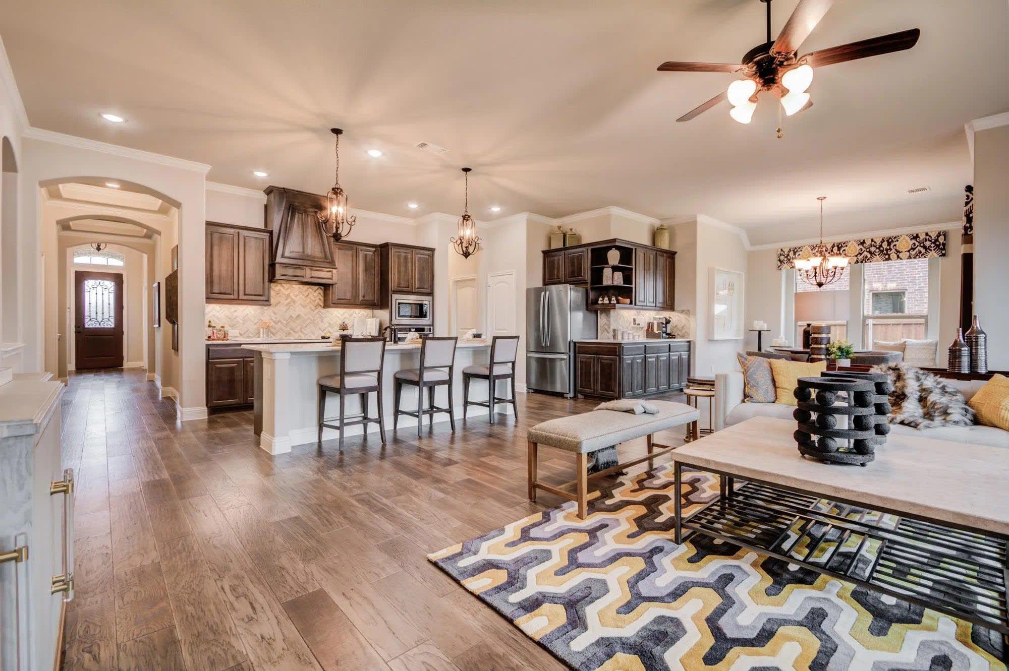 Family Room to Kitchen | Concept 2622 at Redden Farms - Signature Series in Midlothian, TX by Landsea Homes