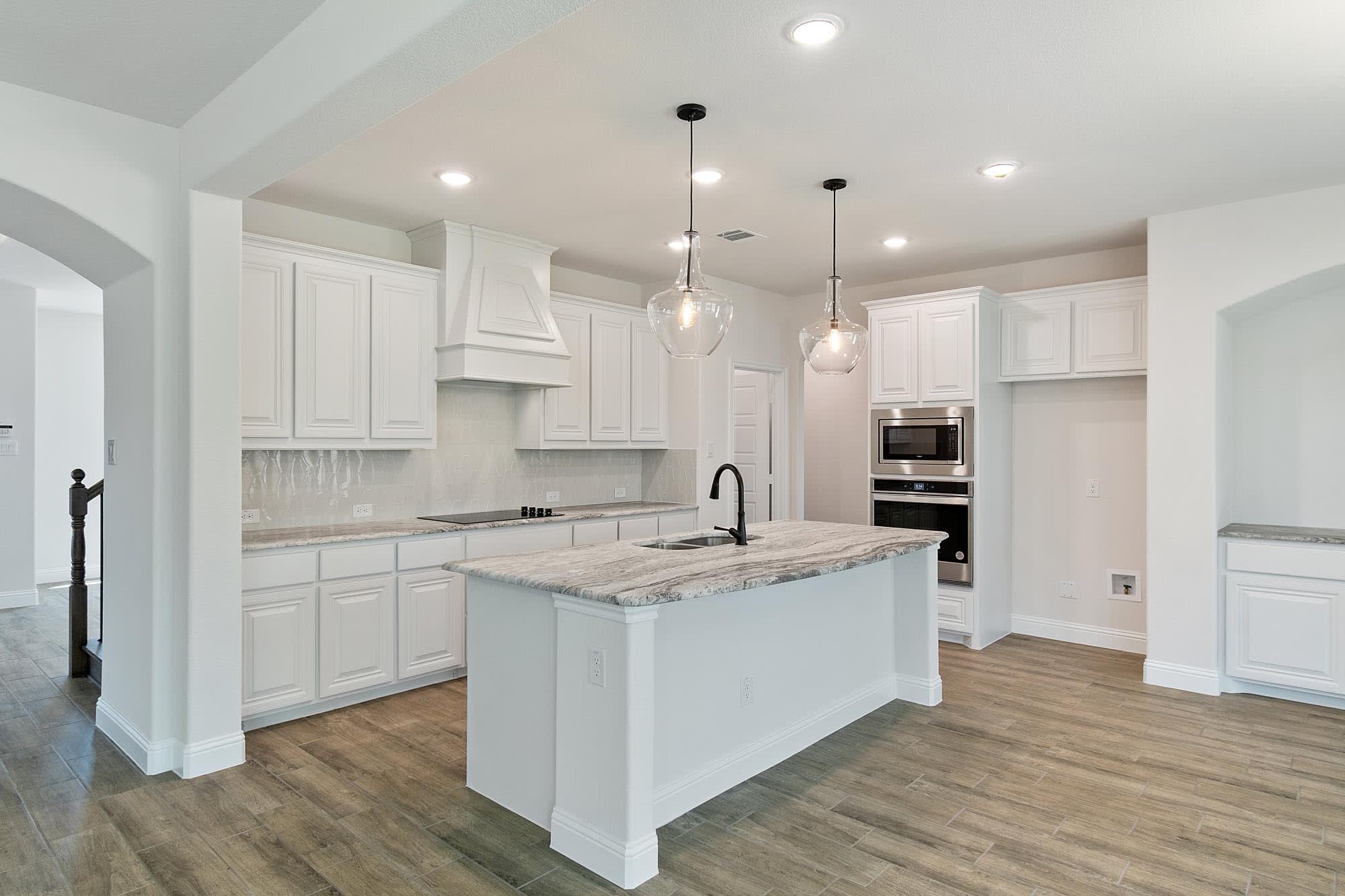 Kitchen | Concept 2972 at Mockingbird Hills in Joshua, TX by Landsea Homes