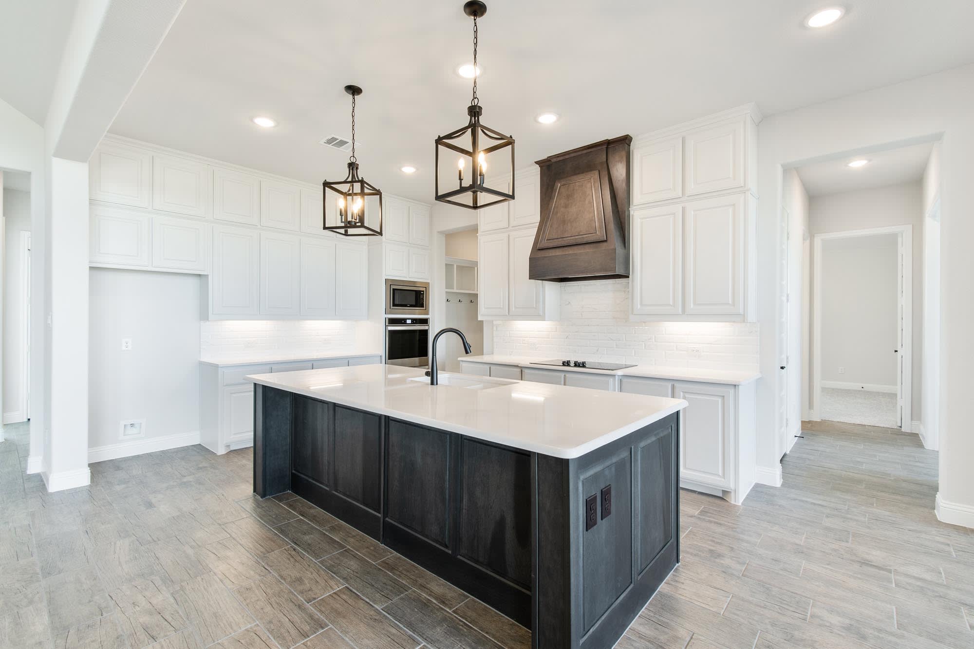 Kitchen | Concept 3141 at The Meadows in Gunter, TX by Landsea Homes