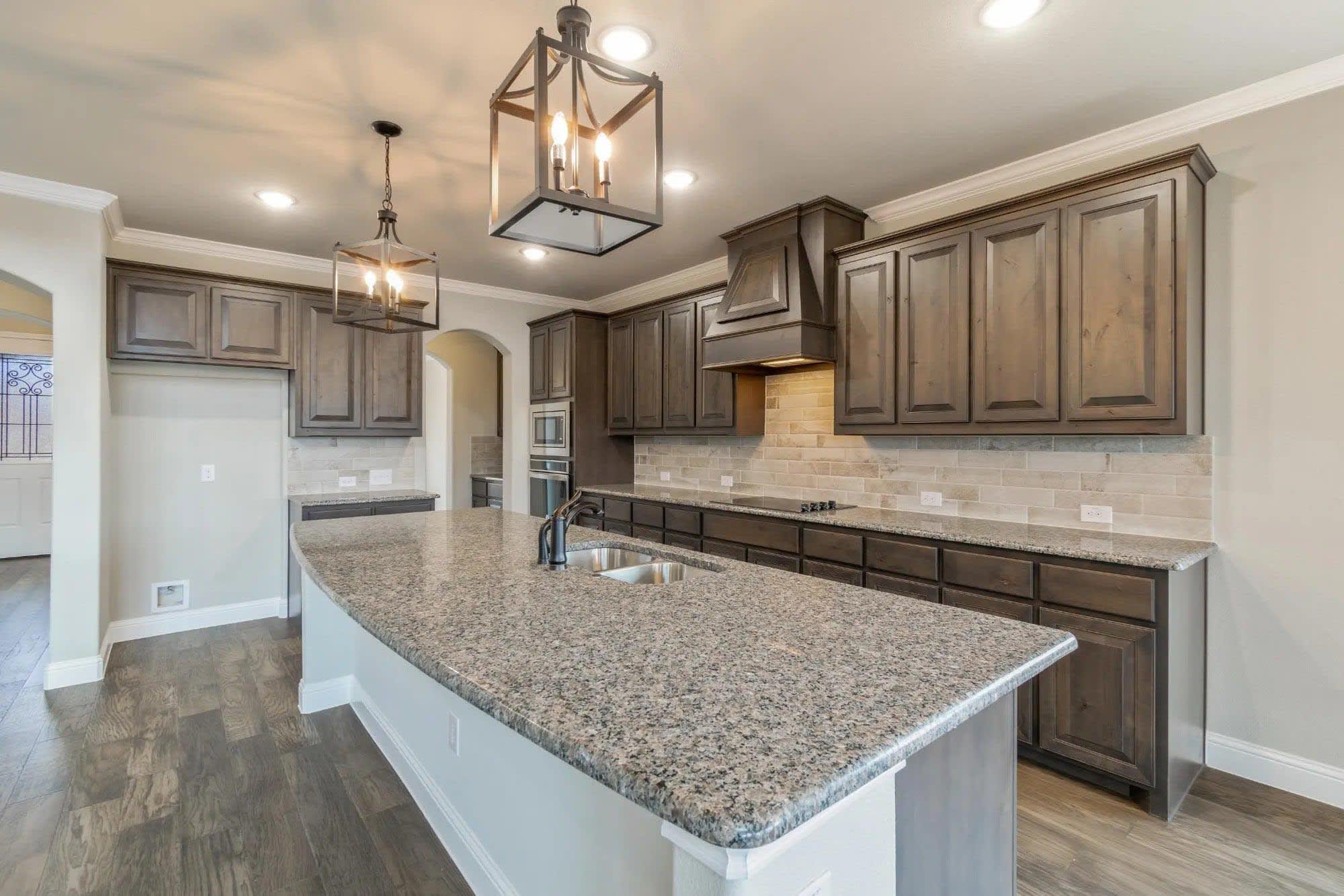 Kitchen | Concept 3218 at Coyote Crossing in Godley, TX by Landsea Homes