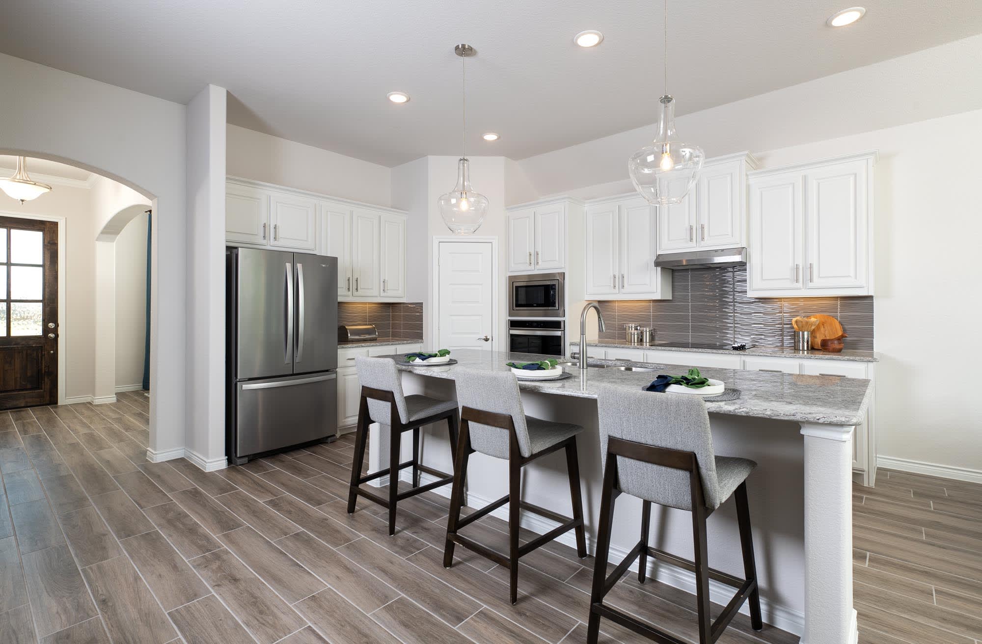 Kitchen | Concept 2267 at Mockingbird Hills in Joshua, TX by Landsea Homes