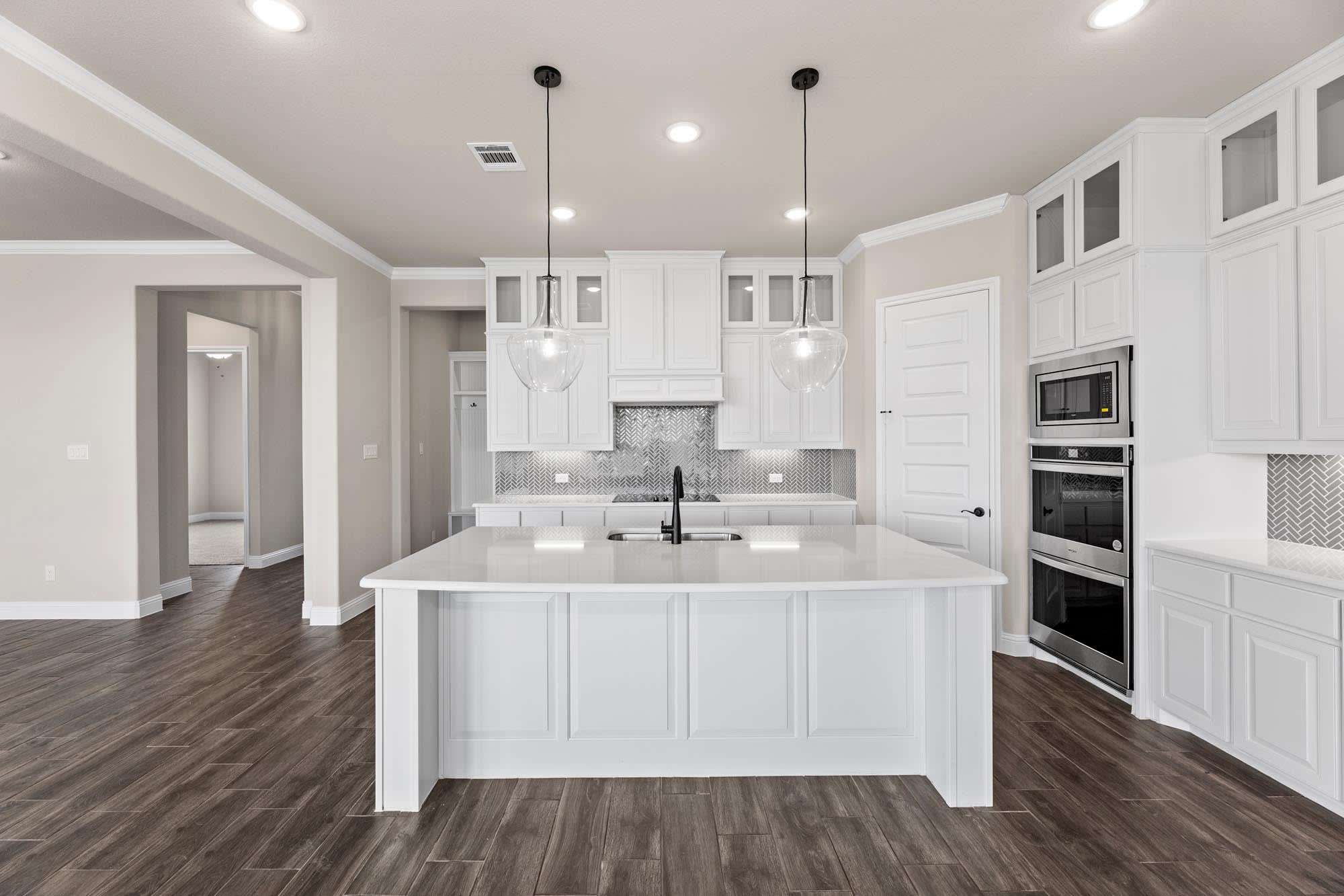 Kitchen | Concept 2623 at Hidden Creek Estates in Van Alstyne, TX by Landsea Homes