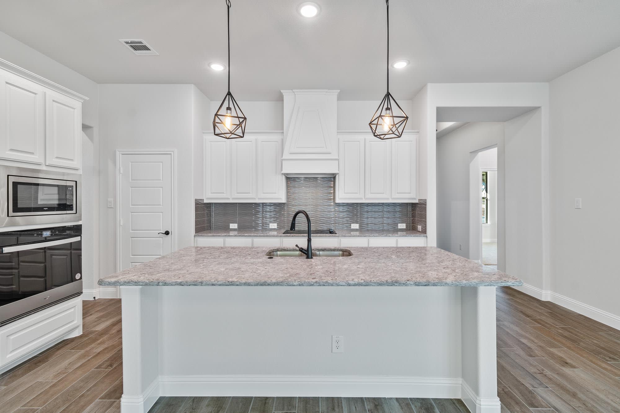 Kitchen | Concept 2050 at Abe's Landing in Granbury, TX by Landsea Homes