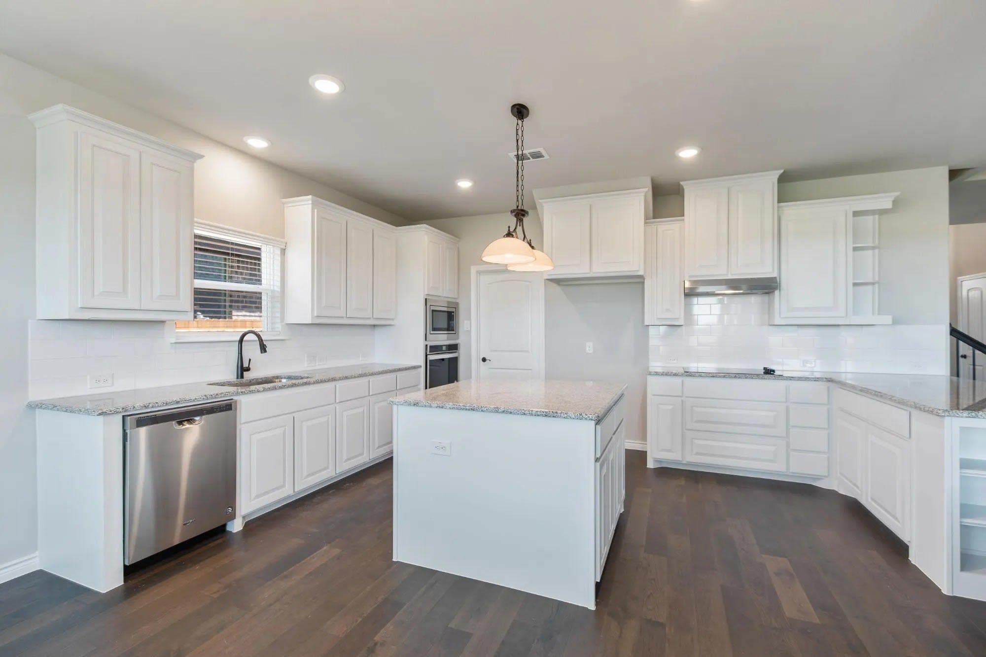 Kitchen | Concept 2393 at Coyote Crossing in Godley, TX by Landsea Homes
