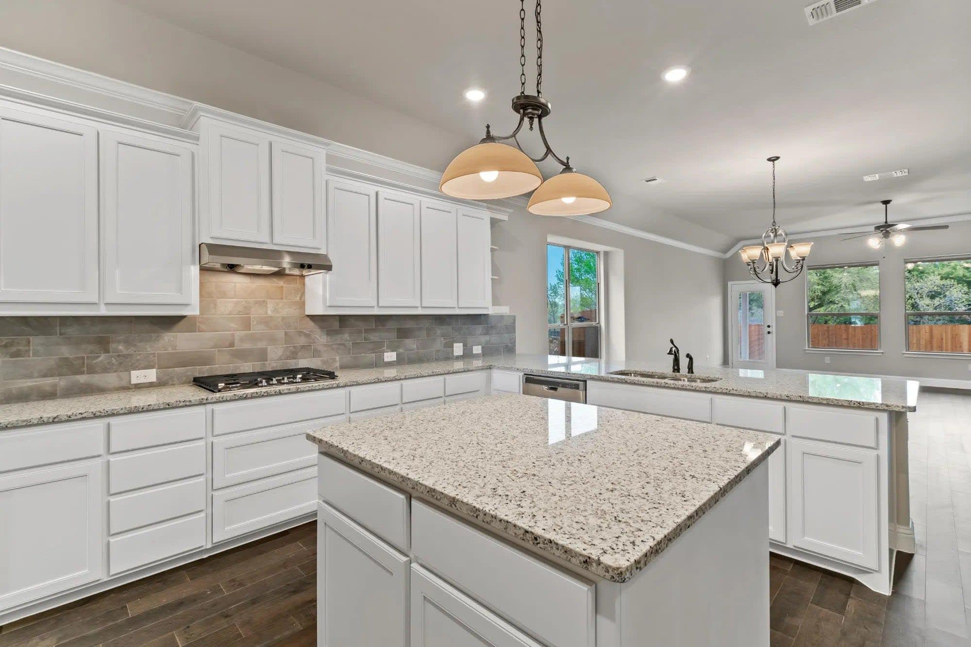 Kitchen | Concept 2533 at Abe's Landing in Granbury, TX by Landsea Homes