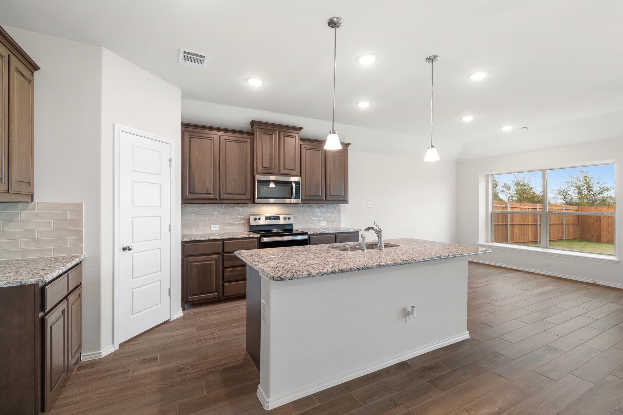 Kitchen | Concept 1660 at Summer Crest in Fort Worth, TX by Landsea Homes