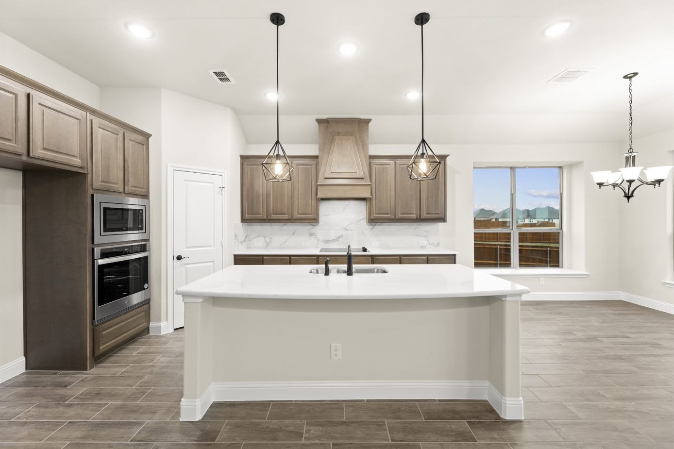 Kitchen | Concept 2370 at Oak Hills in Burleson, TX by Landsea Homes