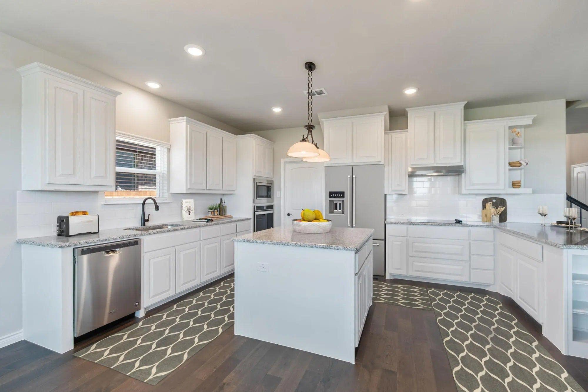 Kitchen | Concept 2393 at Coyote Crossing in Godley, TX by Landsea Homes