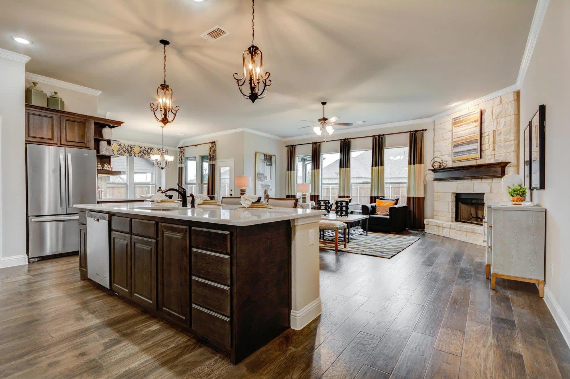 Kitchen & Family Room | Concept 2622 at Abe's Landing in Granbury, TX by Landsea Homes