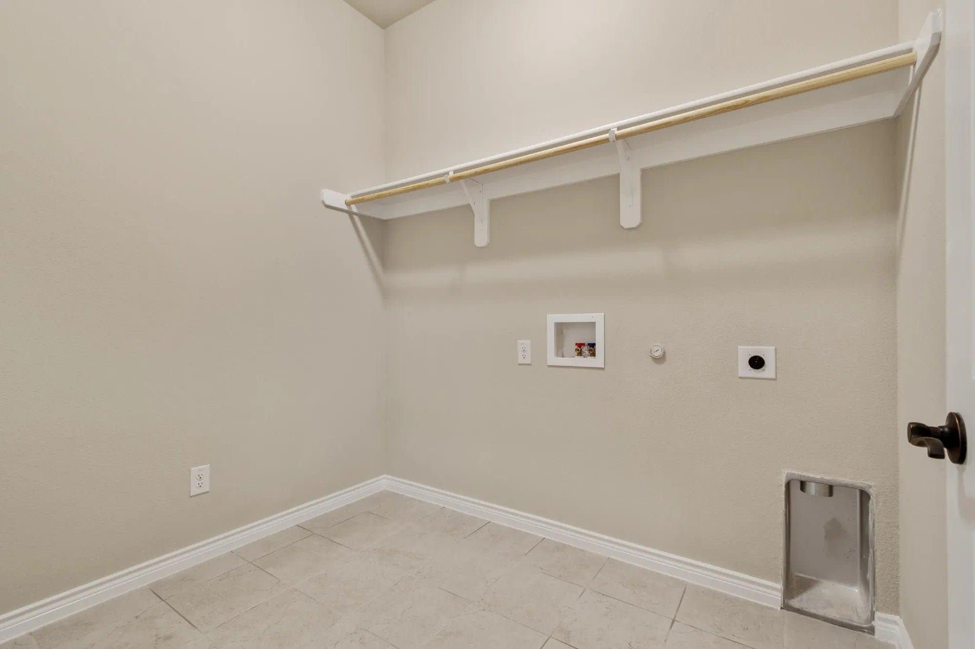 Laundry Room | Concept 2671 at Mockingbird Hills in Joshua, TX by Landsea Homes