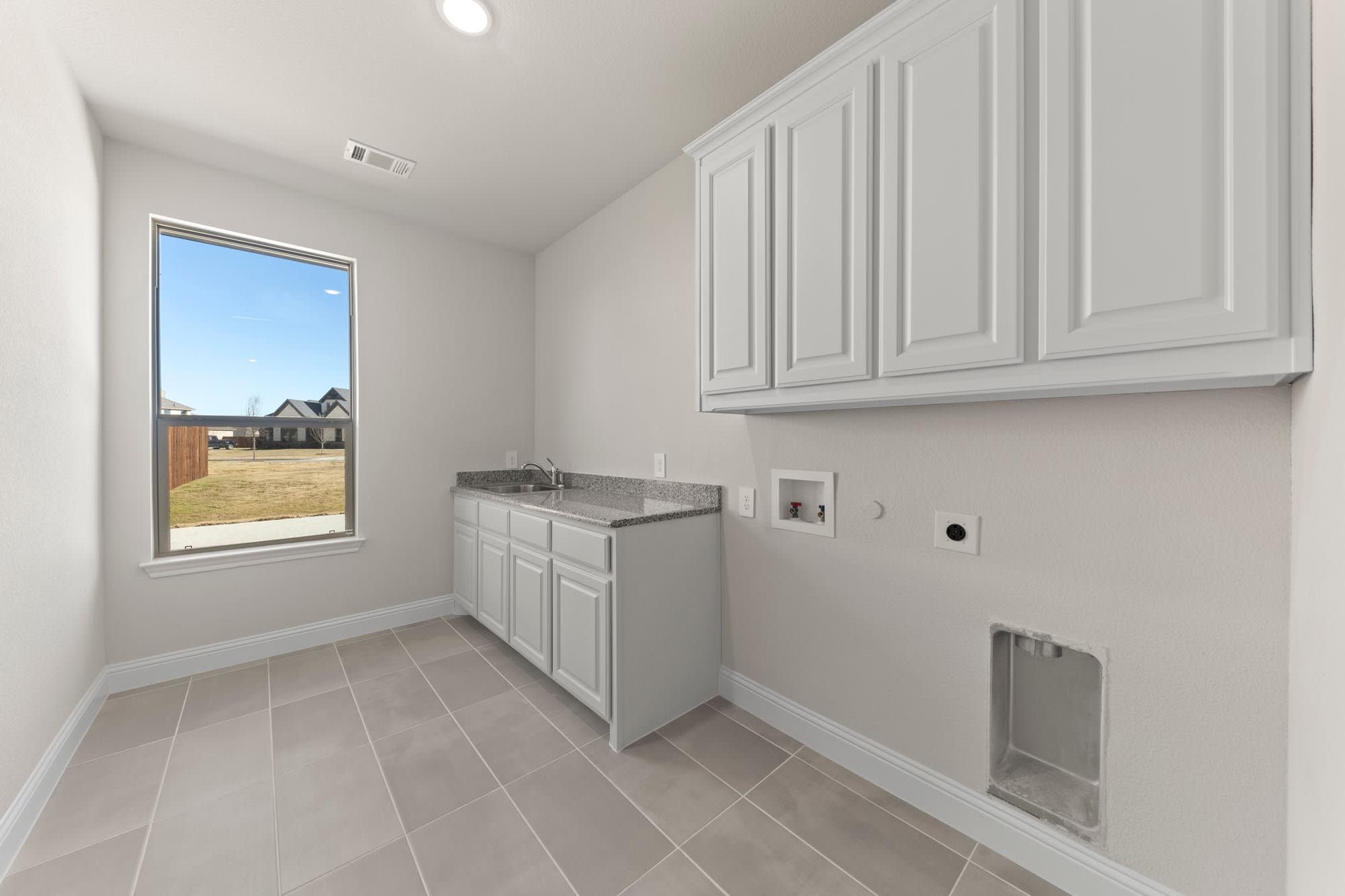 Laundry Room | Concept 3141 at The Meadows in Gunter, TX by Landsea Homes
