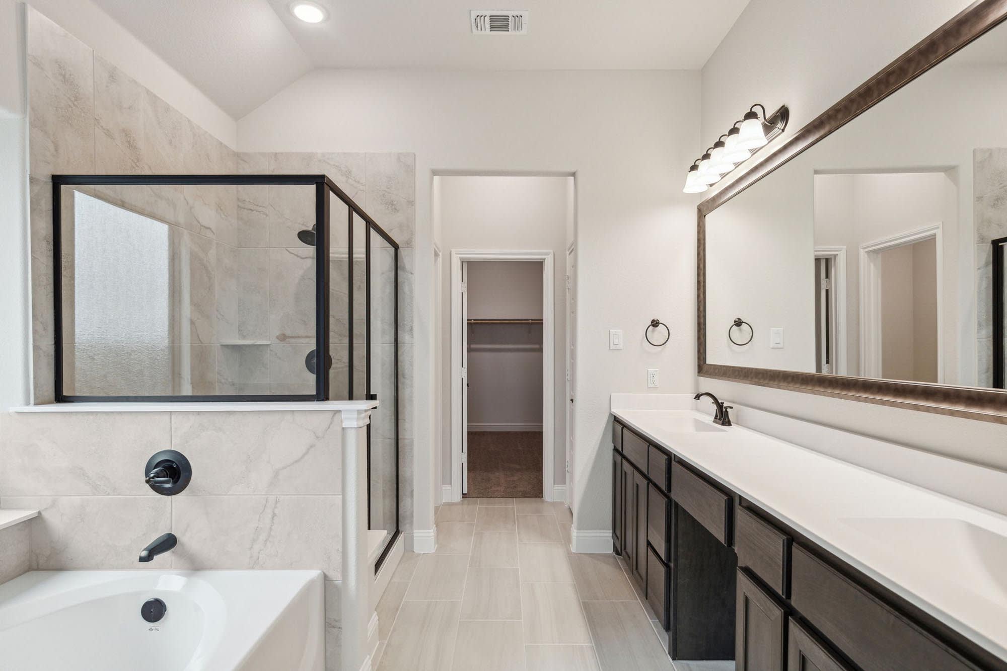 Primary Bathroom | Concept 2050 at Coyote Crossing in Godley, TX by Landsea Homes