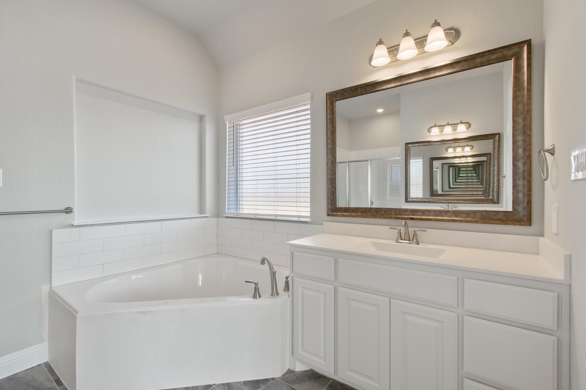 Primary Bathroom | Concept 2623 at Hidden Creek Estates in Van Alstyne, TX by Landsea Homes