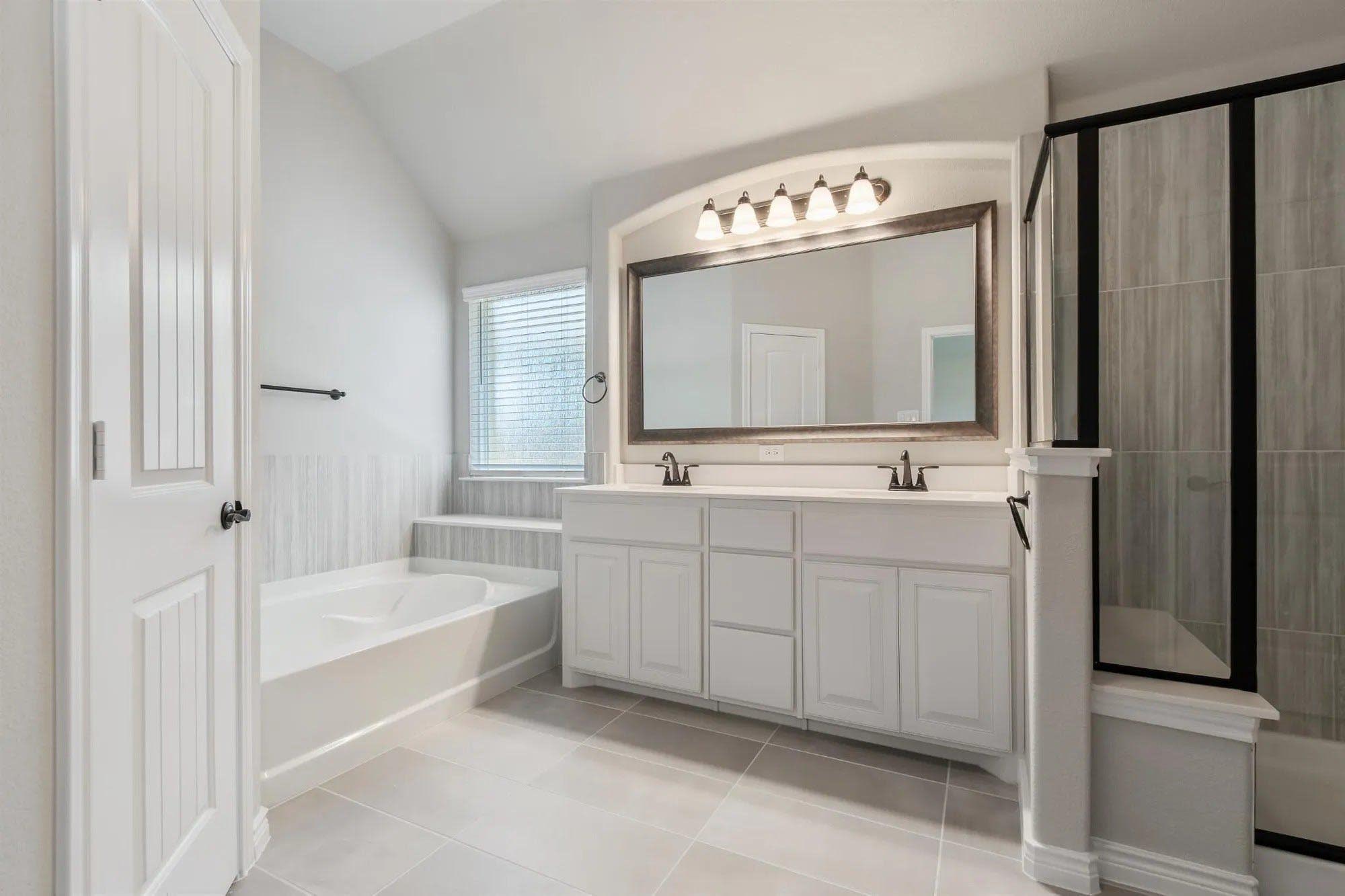 Primary Bathroom | Concept 2393 at Mockingbird Hills in Joshua, TX by Landsea Homes