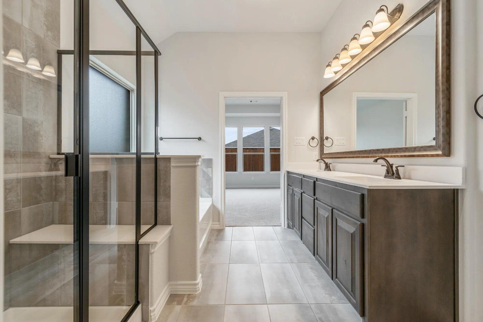 Primary Bathroom | Concept 1841 at Coyote Crossing in Godley, TX by Landsea Homes