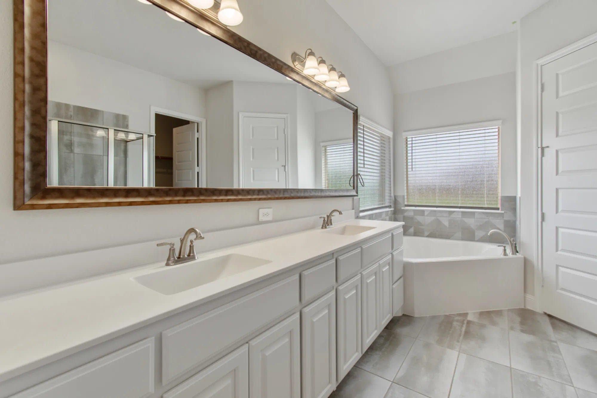 Primary Bathroom | Concept 2797 at Hidden Creek Estates in Van Alstyne, TX by Landsea Homes
