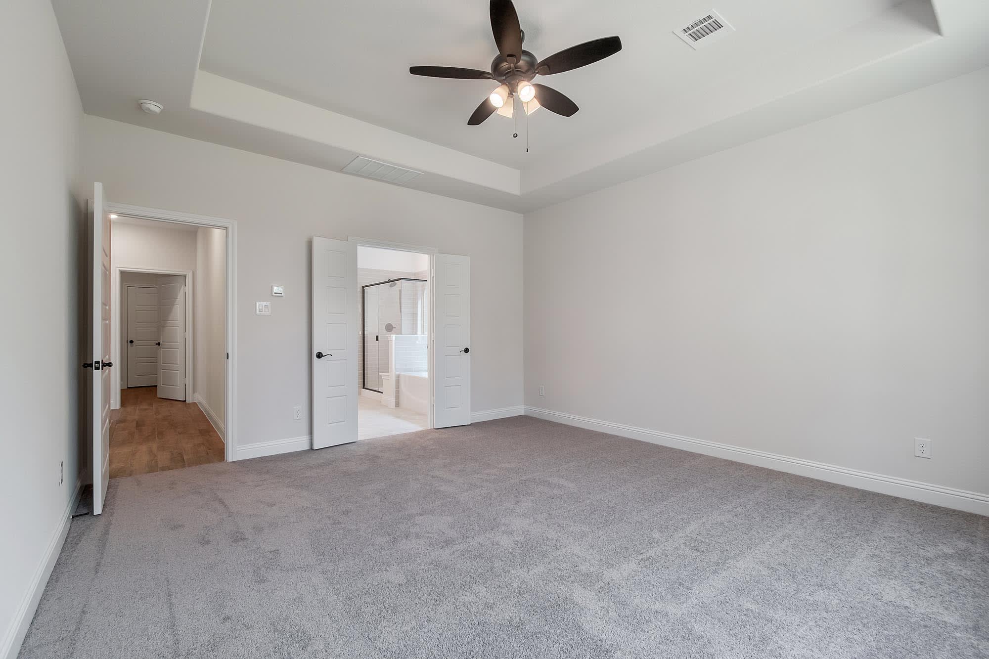 Primary Bedroom | Concept 2972 at Coyote Crossing in Godley, TX by Landsea Homes