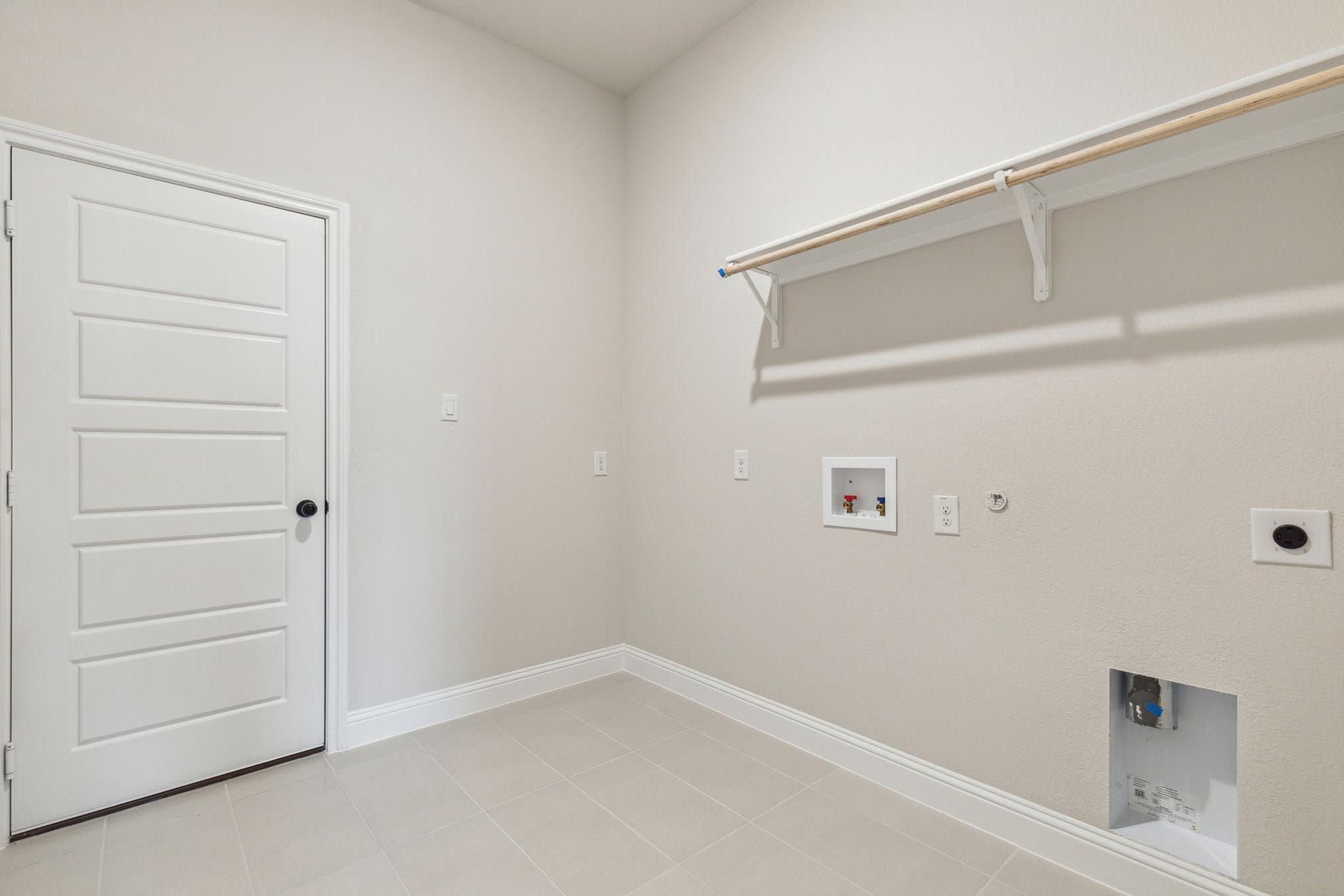 Utility Room | Concept 2050 at Abe's Landing in Granbury, TX by Landsea Homes