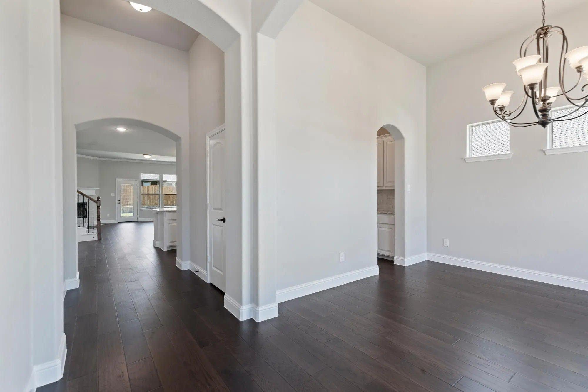 Dining Room to Foyer | Concept 3015 at Belle Meadows in Cleburne, TX by Landsea Homes