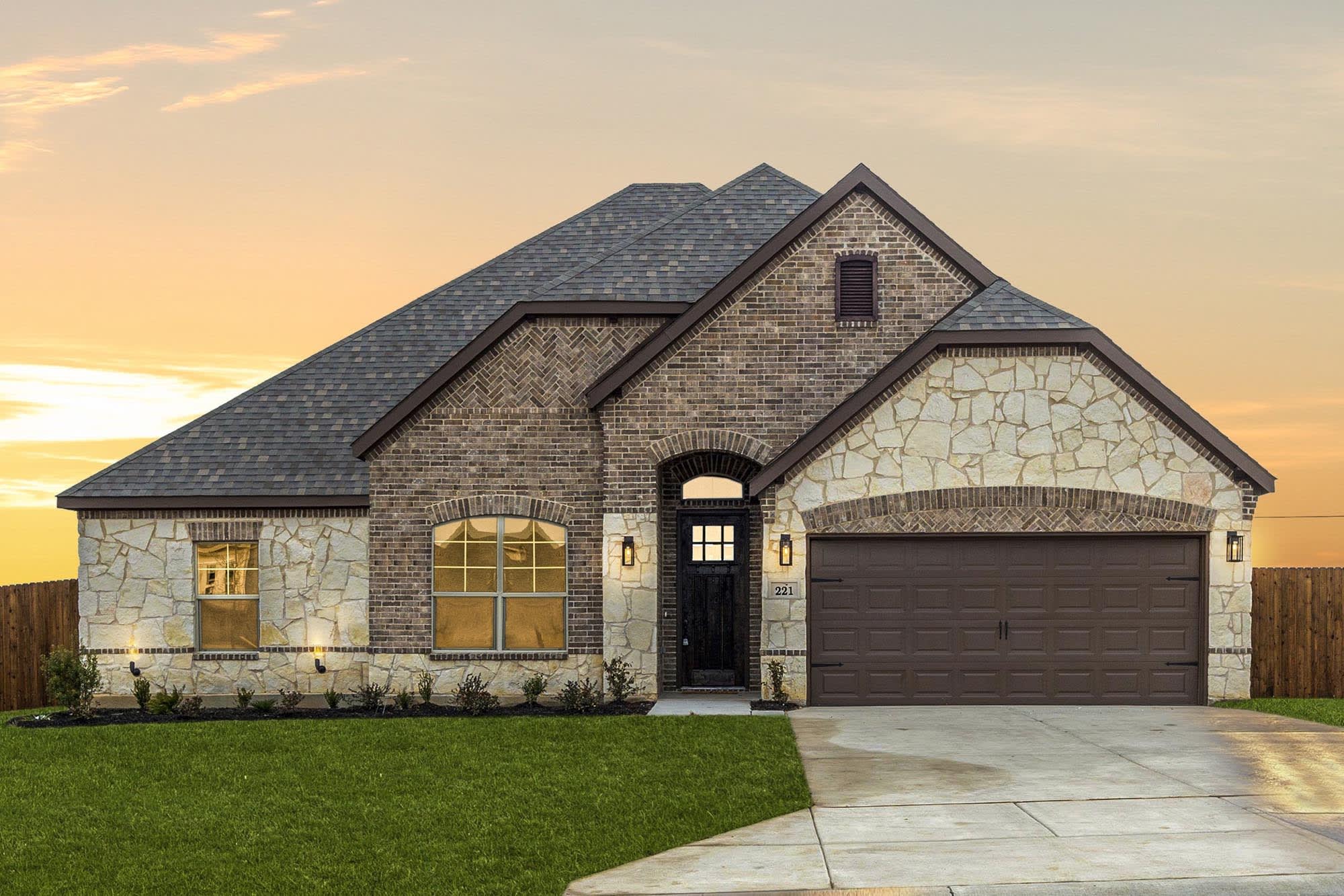 Elevation D with Stone | Concept 2027 at Belle Meadows in Cleburne, TX by Landsea Homes