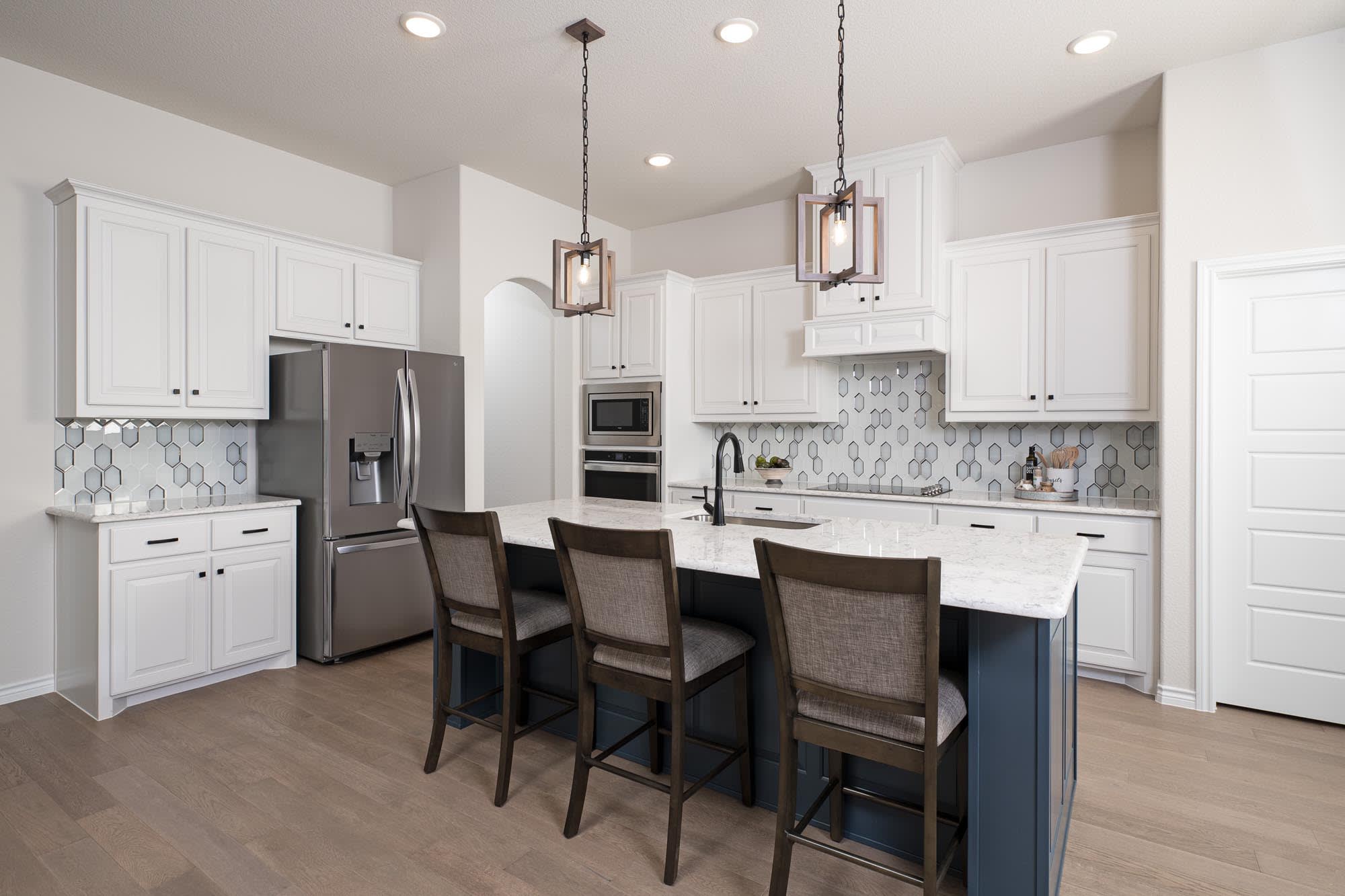 Kitchen | Concept 2464 at Belle Meadows in Cleburne, TX by Landsea Homes