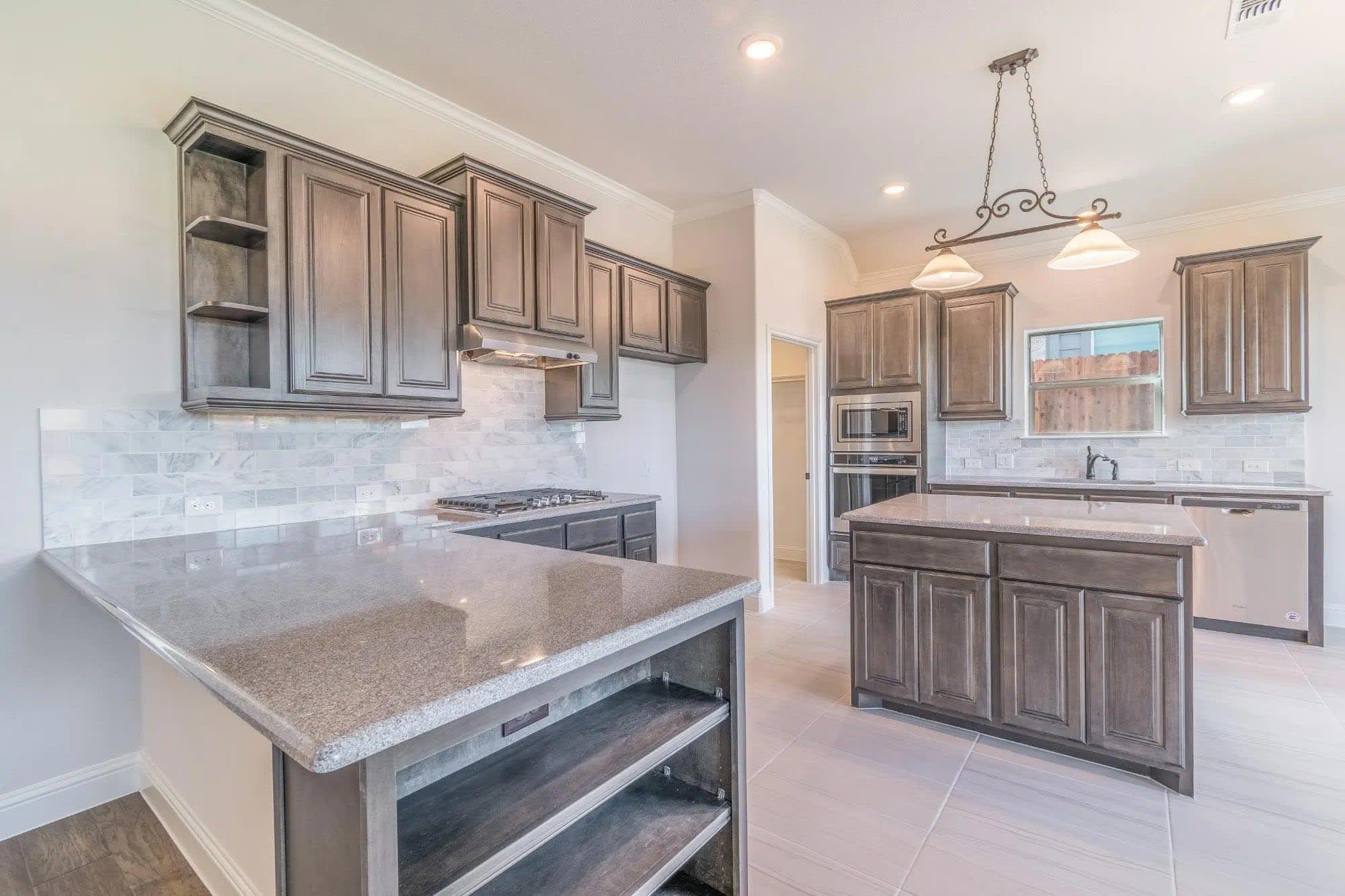 Kitchen | Concept 2027 at Belle Meadows in Cleburne, TX by Landsea Homes