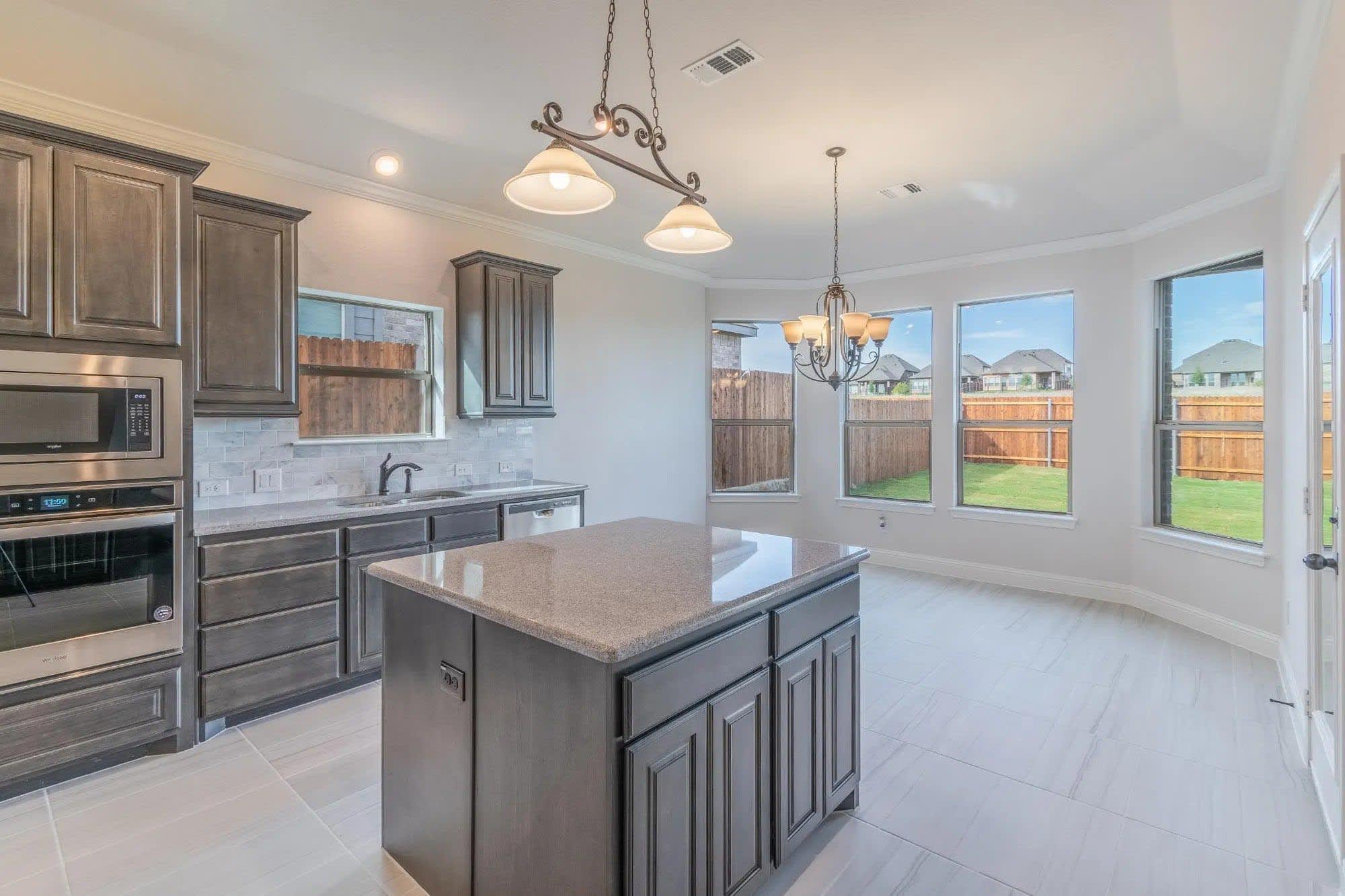 Kitchen | Concept 2027 at Belle Meadows in Cleburne, TX by Landsea Homes