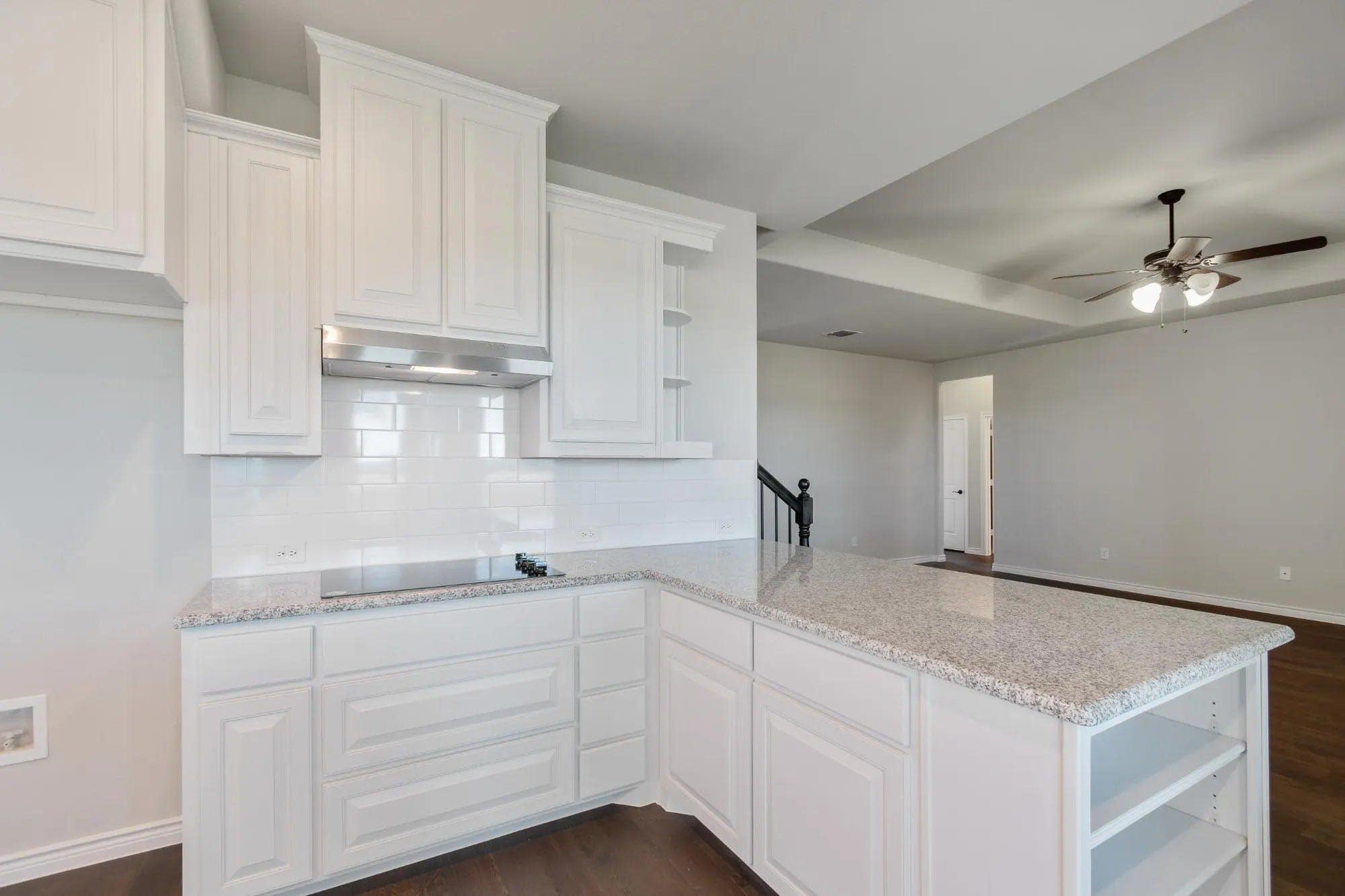 Kitchen & Family Room | Concept 2393 at Lovers Landing in Forney, TX by Landsea Homes
