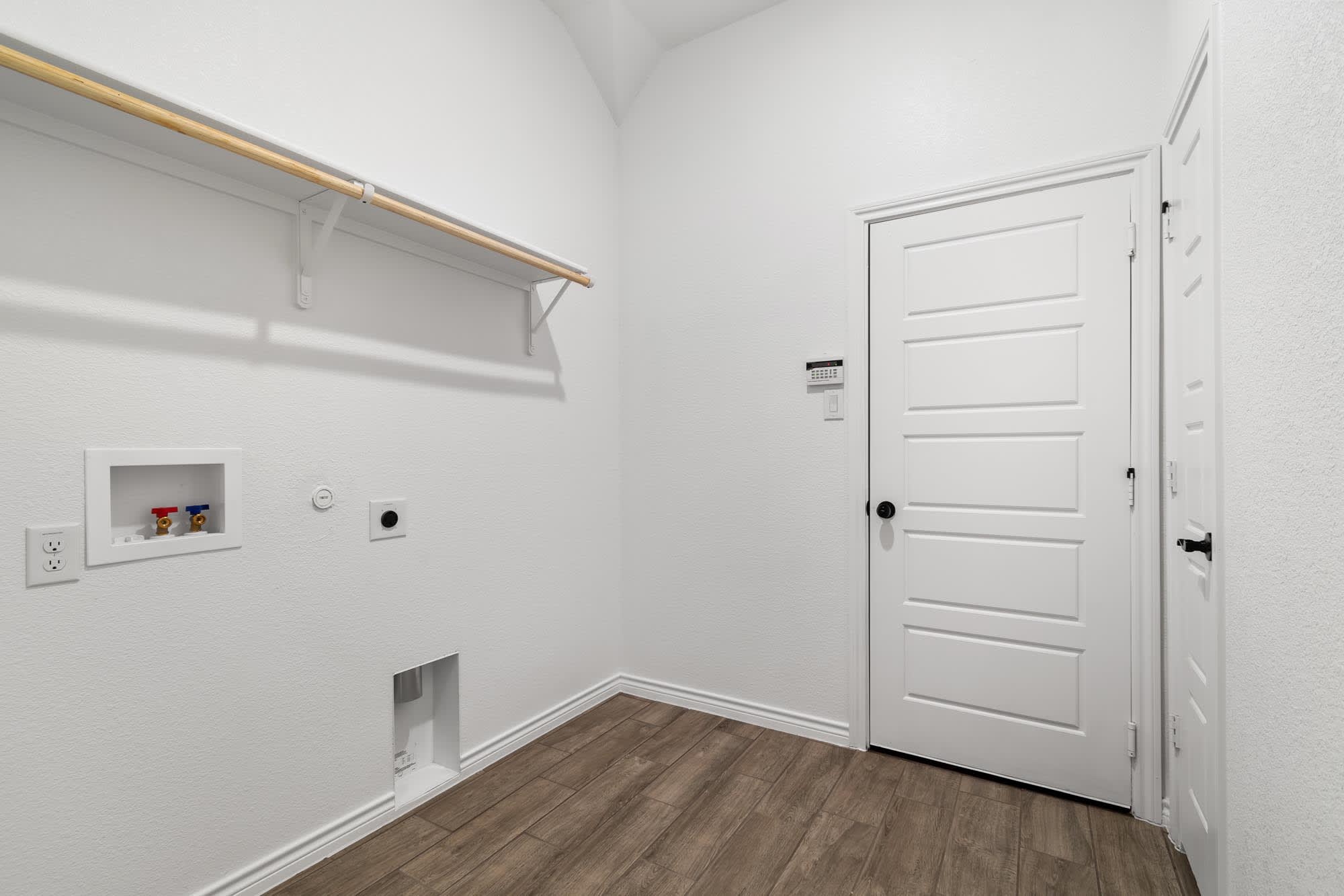 Laundry Room | Concept 2370 at Lovers Landing in Forney, TX by Landsea Homes