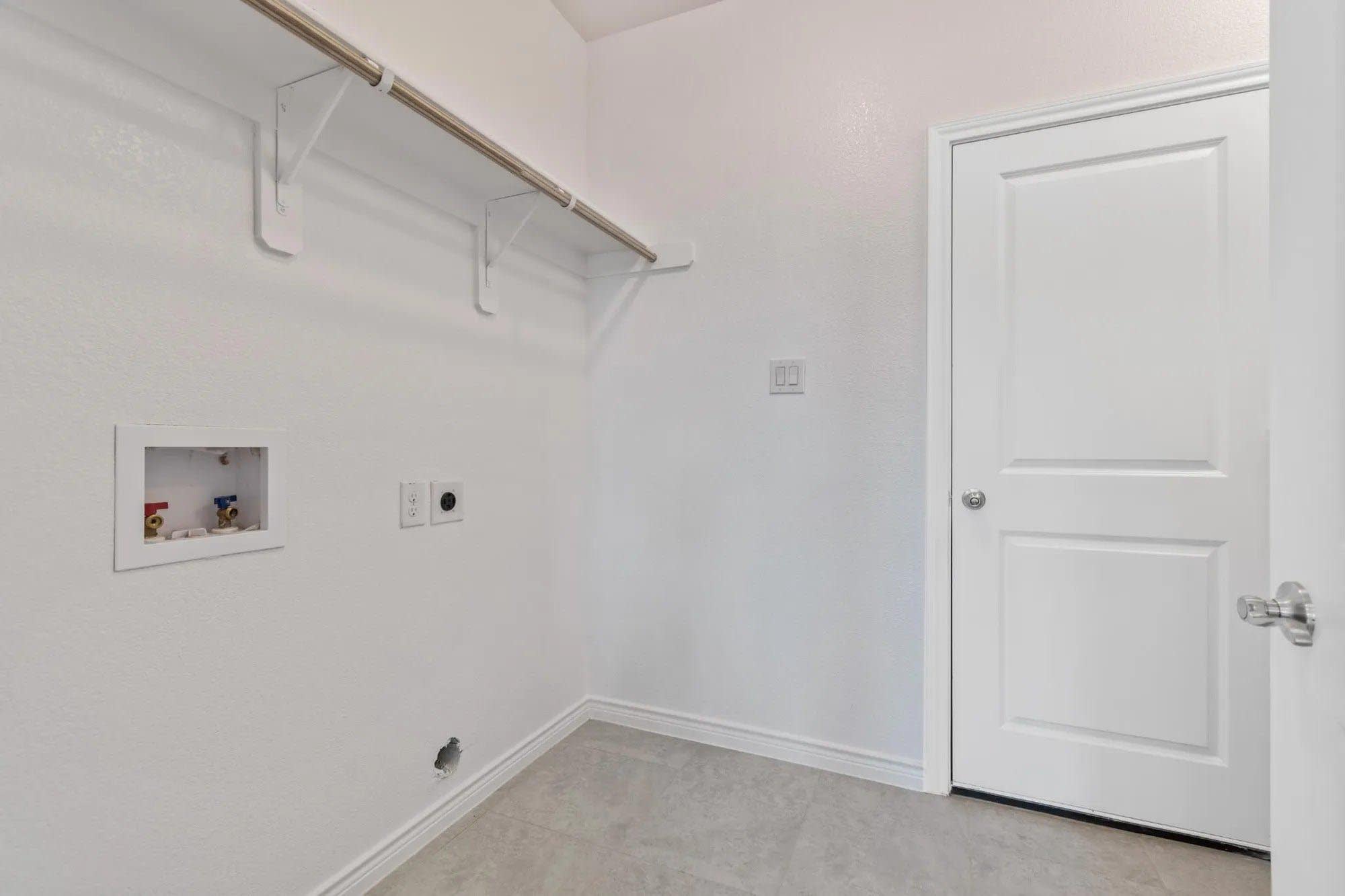 Laundry Room | Concept 2393 at Lovers Landing in Forney, TX by Landsea Homes