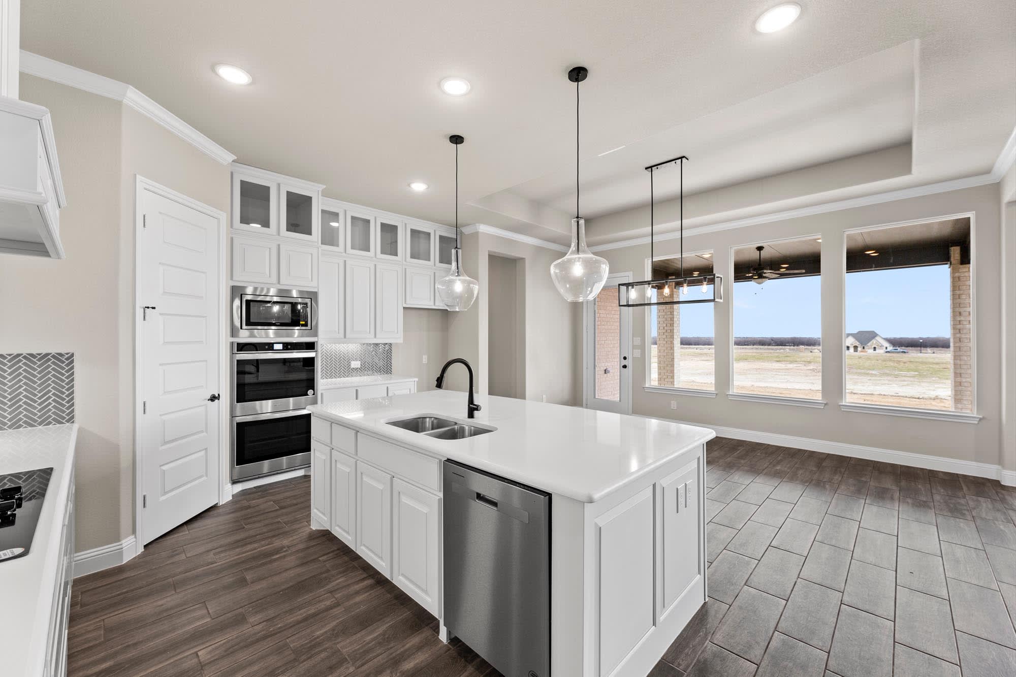 Kitchen | Concept 2623 at Mockingbird Hills in Joshua, TX by Landsea Homes