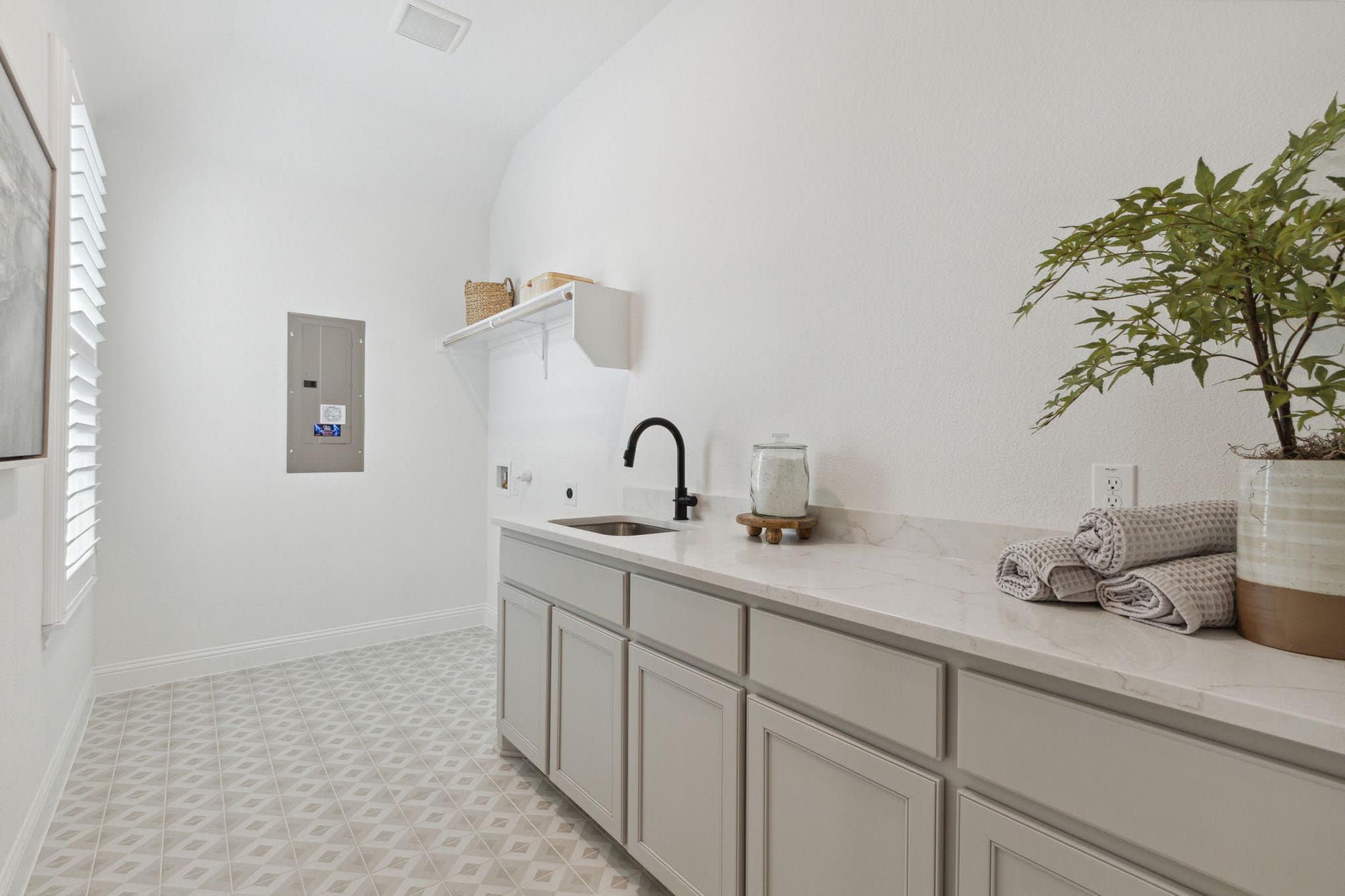 Laundry Room | Concept 3441 at Mockingbird Hills in Joshua, TX by Landsea Homes