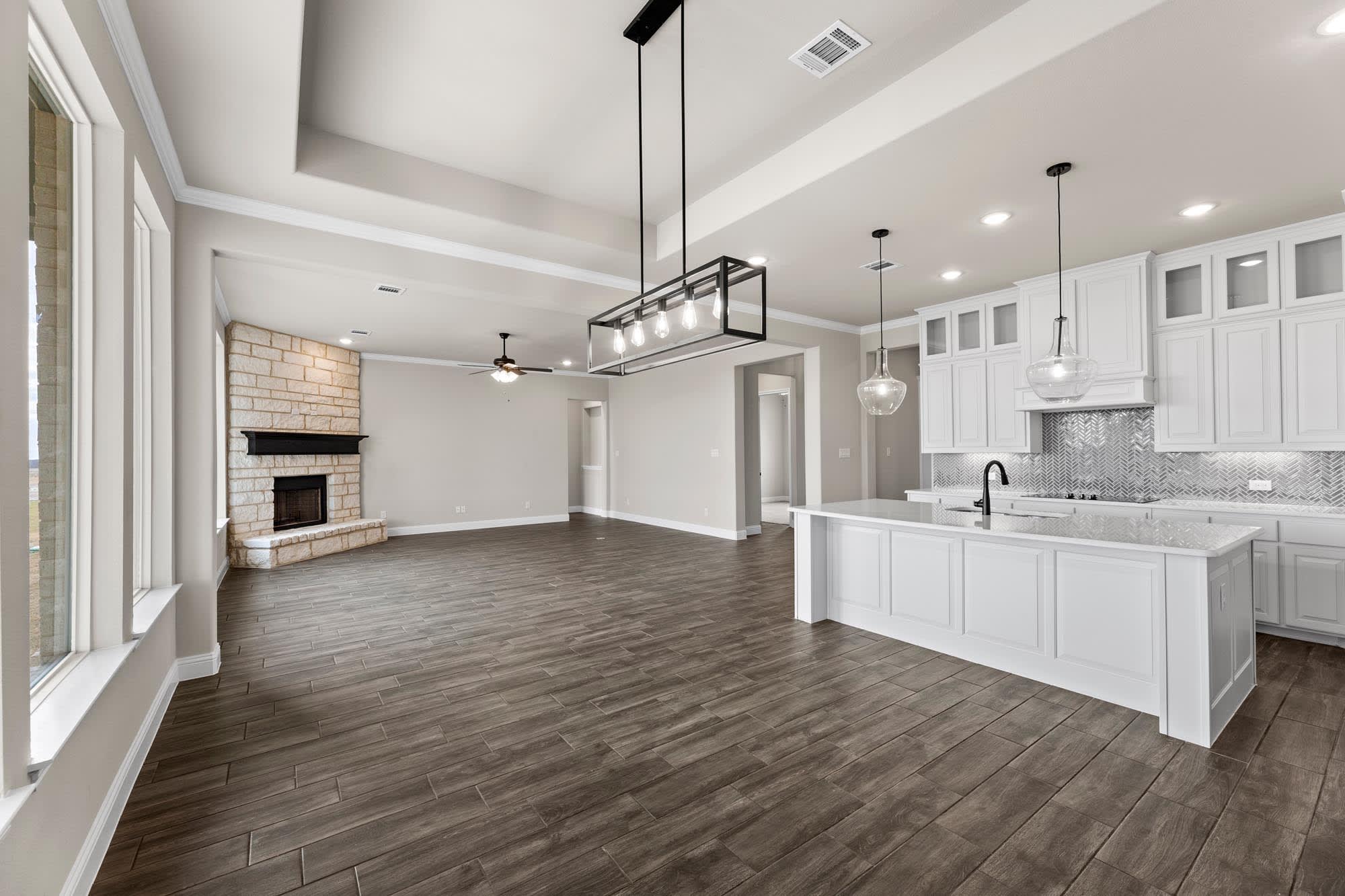 Nook & Family Room | Concept 2623 at Mockingbird Hills in Joshua, TX by Landsea Homes