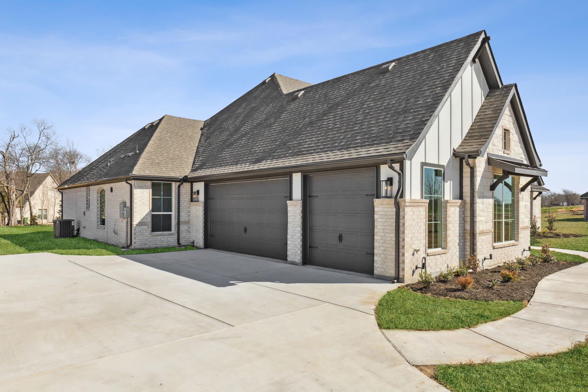 Optional 3-Car Garage | Concept 3441 at Mockingbird Hills in Joshua, TX by Landsea Homes