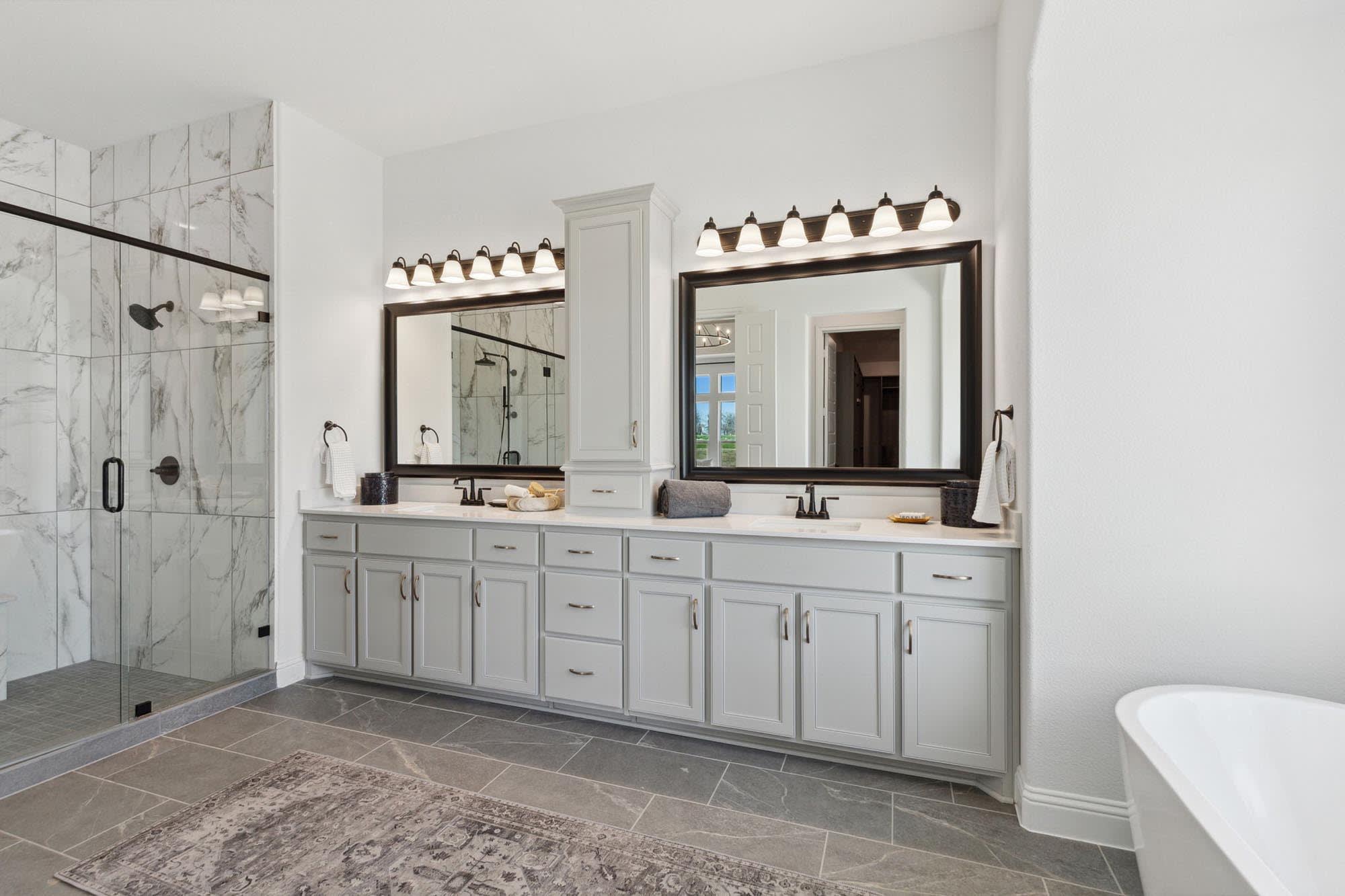 Primary Bathroom | Concept 3441 at Mockingbird Hills in Joshua, TX by Landsea Homes